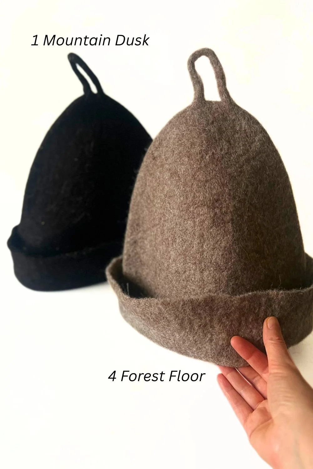 Two undyed wool sauna hats, one black and one brown (Autumn Fleece), hand-sculpted by Dovile