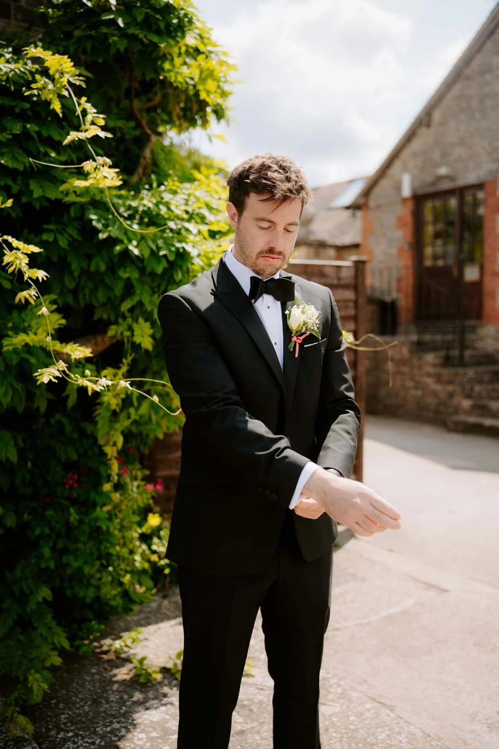 Groom Adjusting Cufflink.jpg