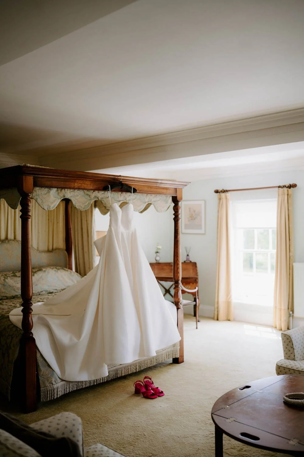 Birtsmorton Court Bridal Prep, Wedding Dress Hanging Up.jpg