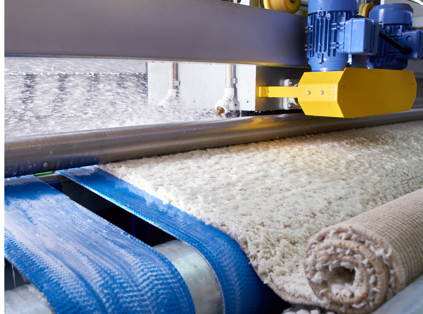 carpet being trimmed by an industrial machine