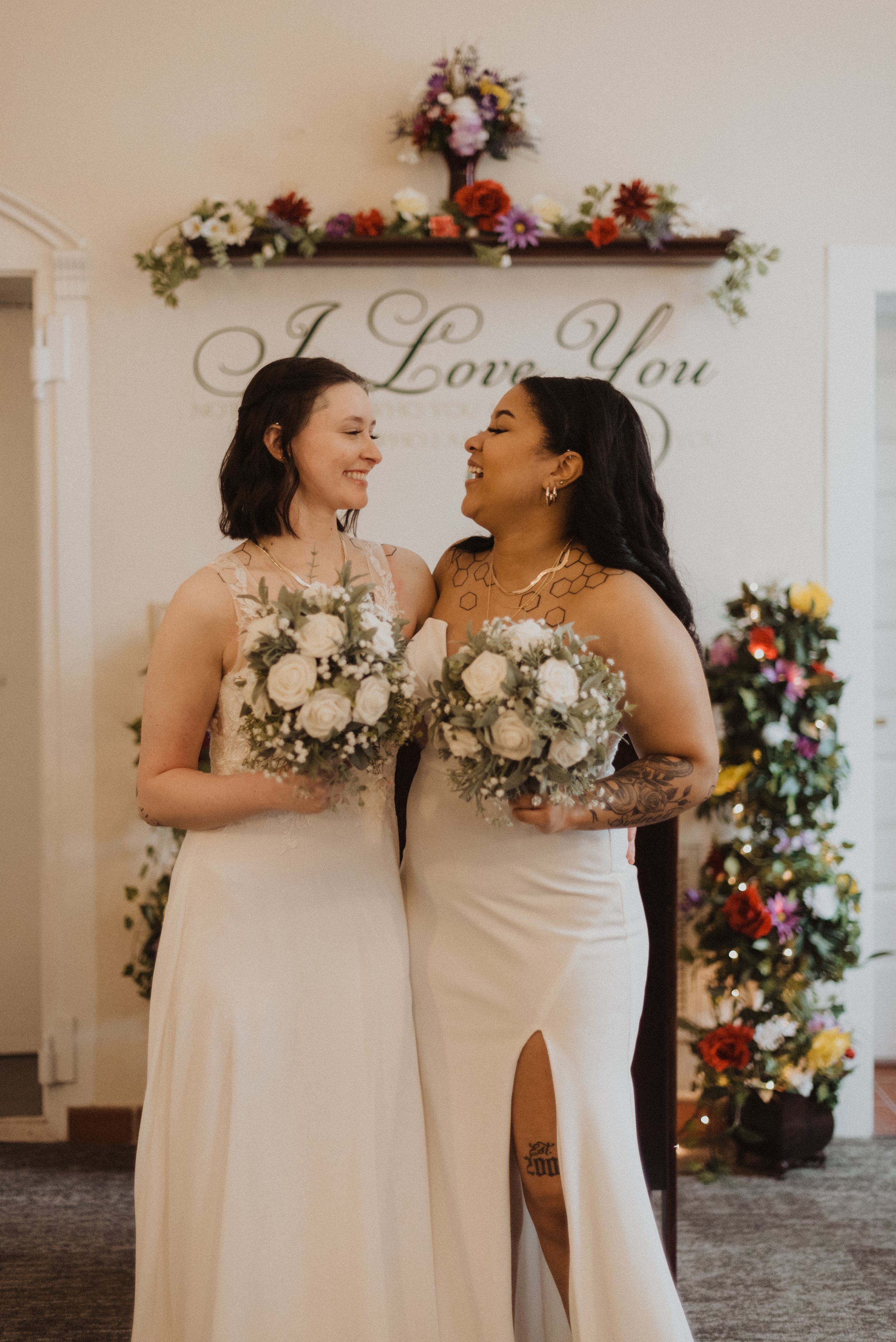 two brides at the altar at the courthouse