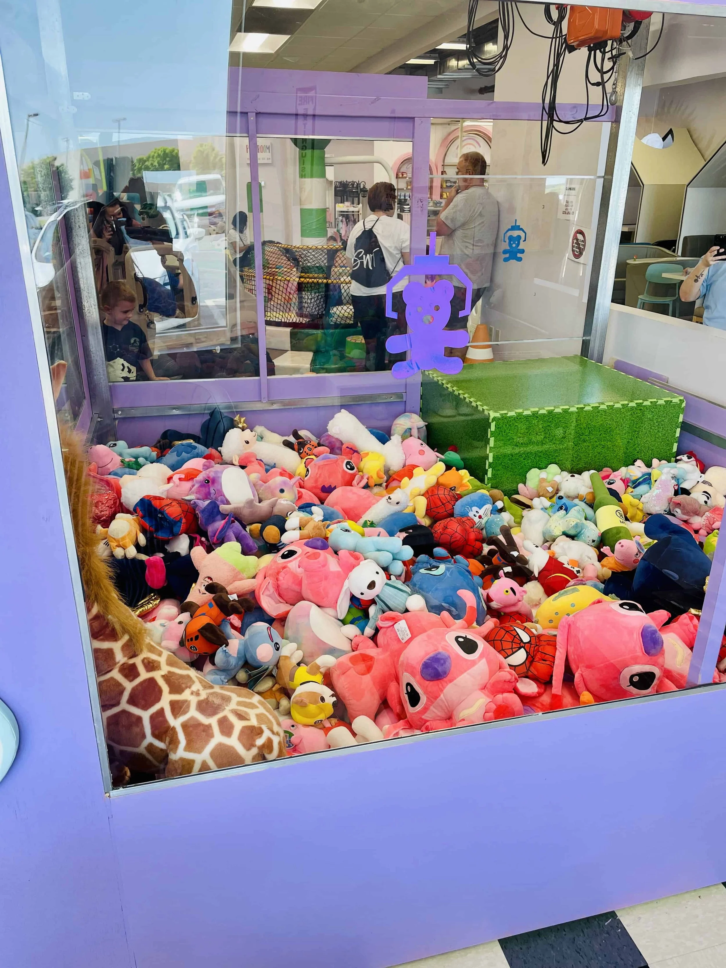 Human Claw Machine — Magic Land Play Café