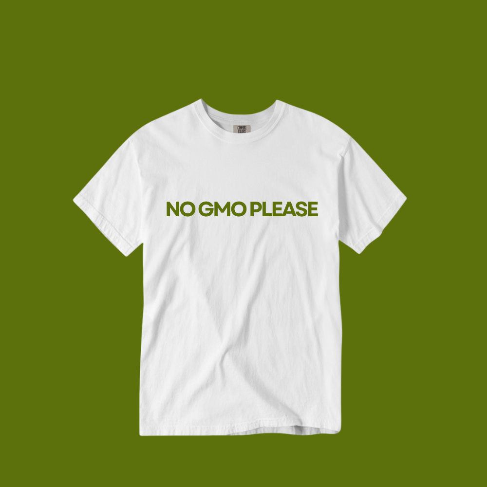 White T-shirt with green text reading "NO GMO PLEASE" on a green background.