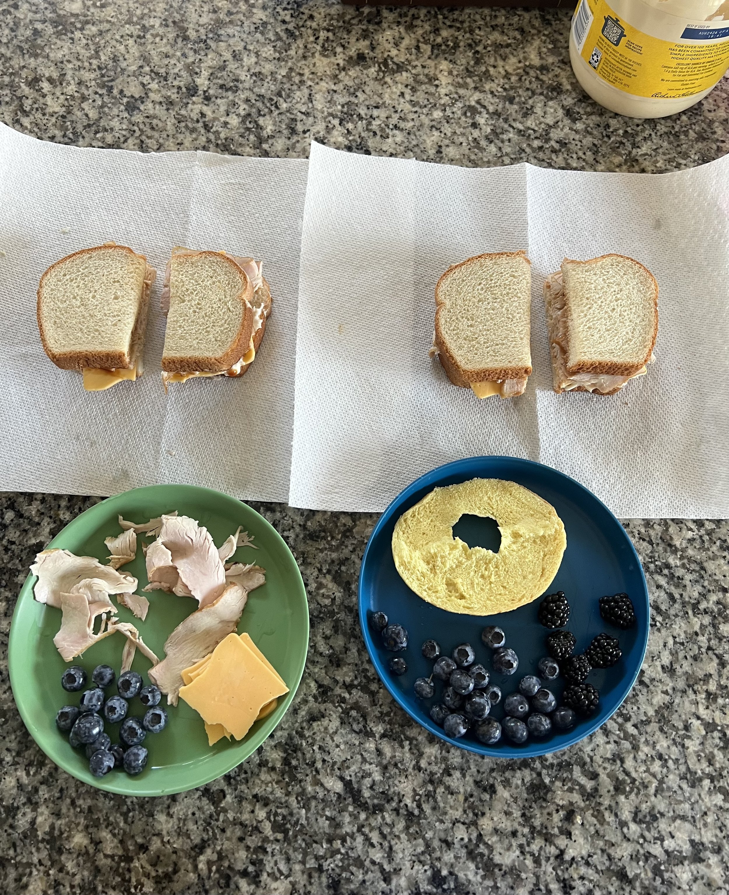 Turkey and cheese sandwiches, deconstructed turkey and cheese sandwich, and blueberries