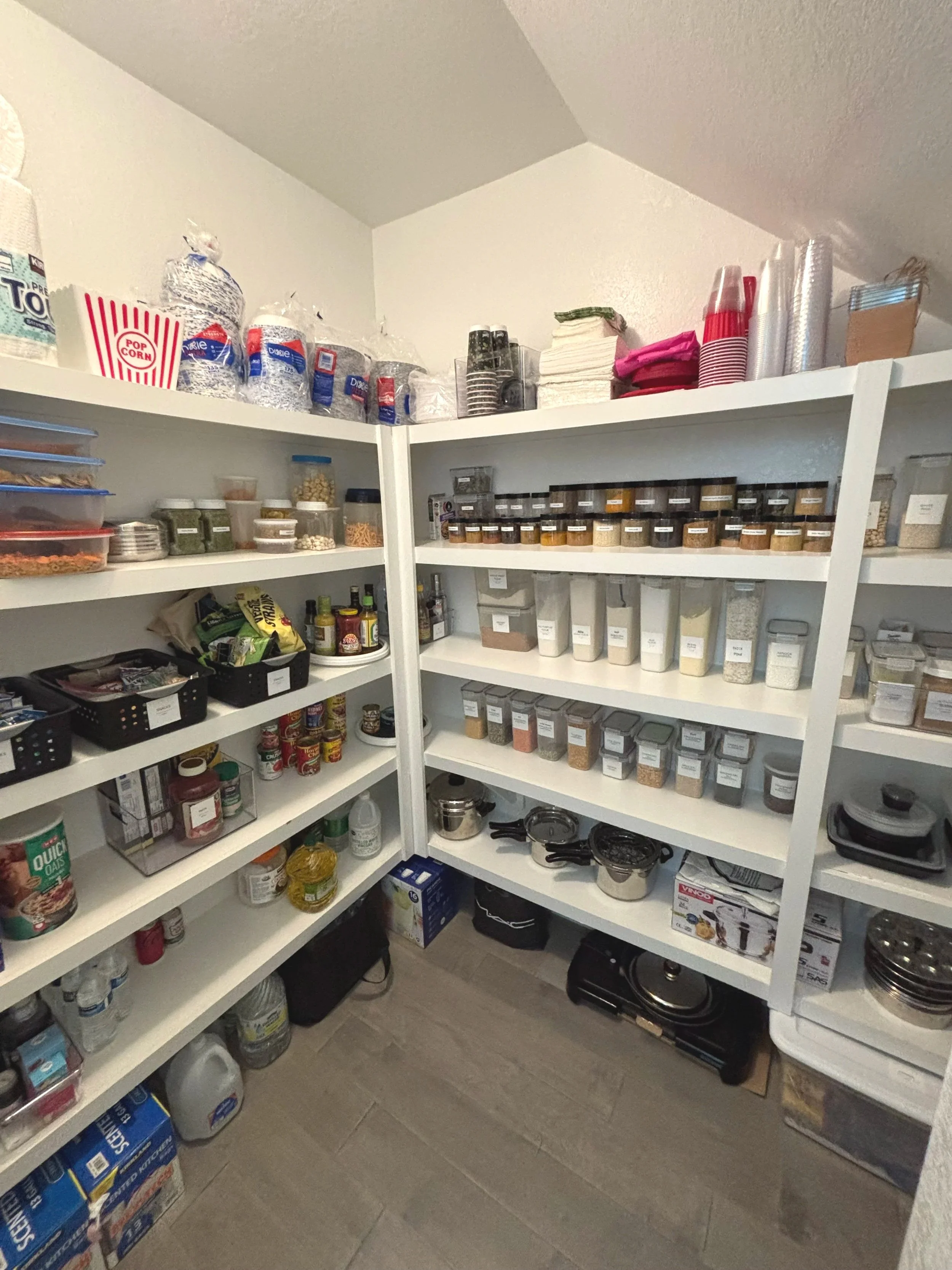 A cluttered pantry can make meal prep and everyday routines more difficult. This pantry was decluttered, categorized, and reorganized to create designated zones for snacks, canned goods, baking supplies, and everyday essentials. A simple, functional 