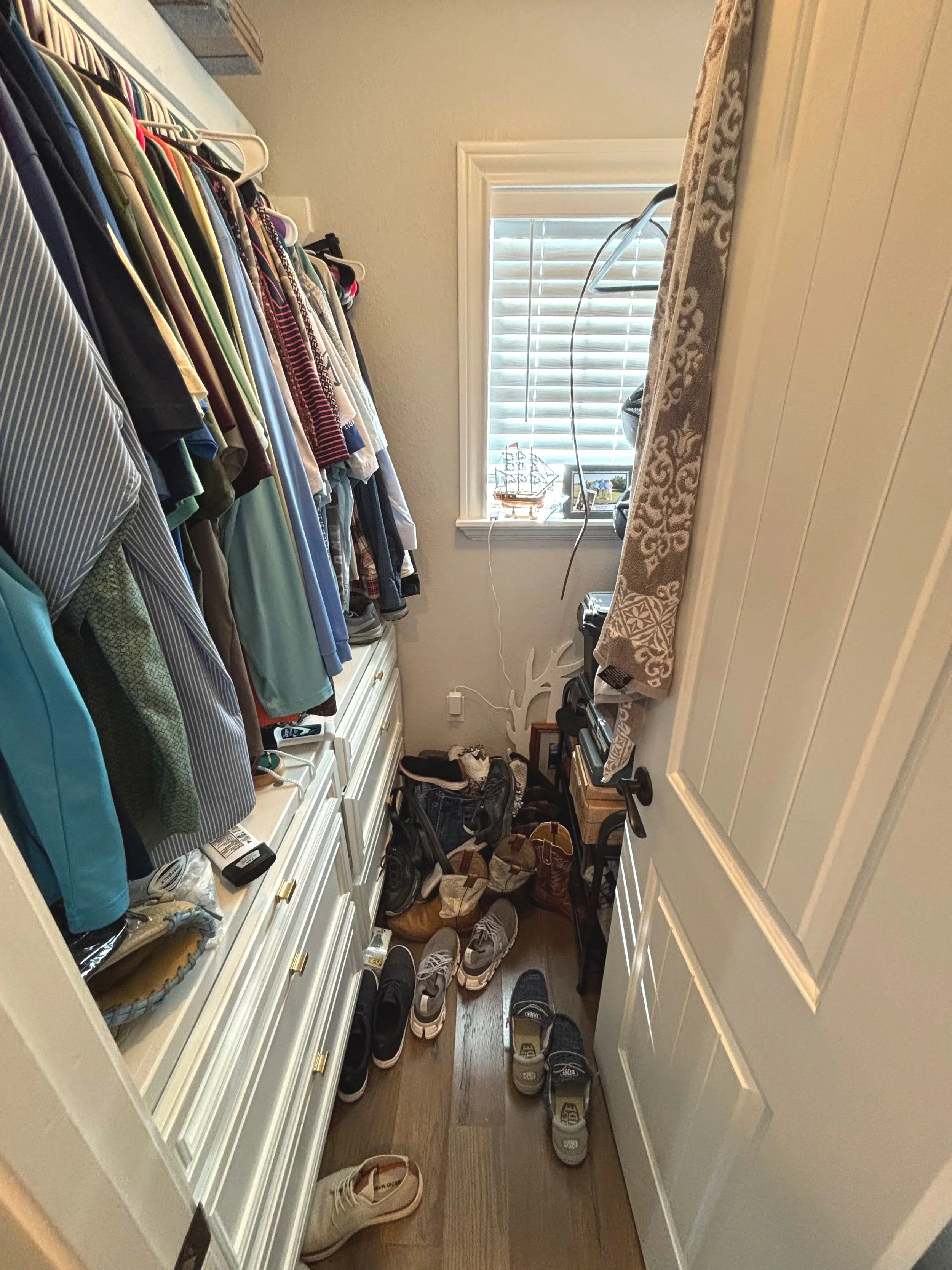 Even a small closet can make a big impact when every inch is used intentionally. We decluttered this space, grouped similar items together, and created practical storage zones to maximize the closet's existing capacity. This quaint home in Manvel, Te