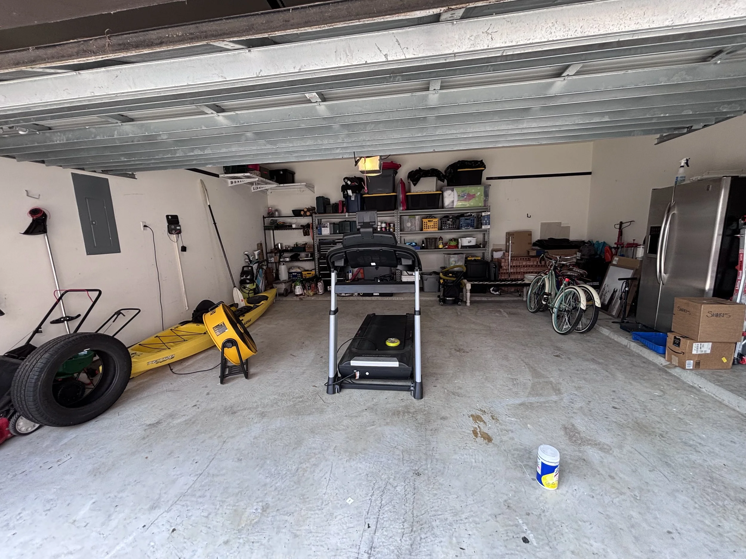 Declutter the garage by creating zones that allow you to find items more quickly and a place to park your vehicles. Creating zones allows items to be accessed and put away more quickly. 
