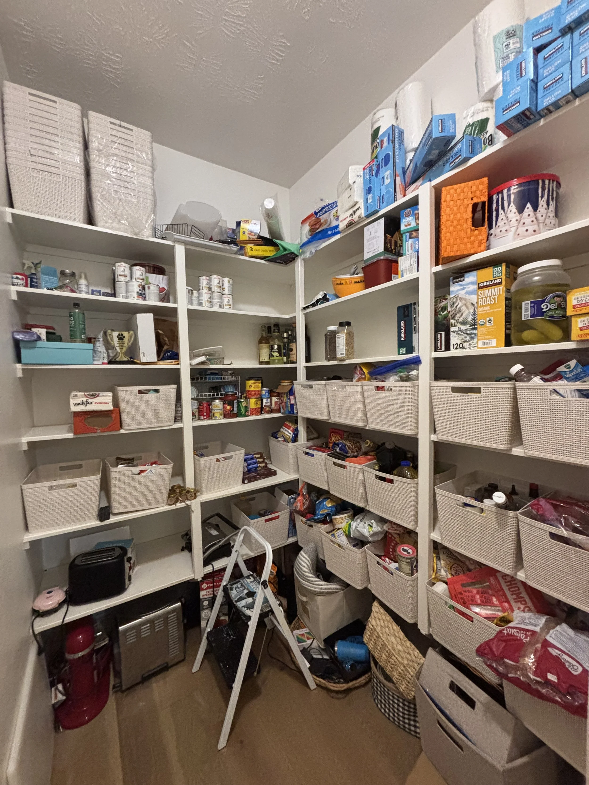 An organized pantry isn't about having the perfect containers—it's about creating a system that works for you and your family. This pantry was thoughtfully decluttered and reorganized to make everyday items easier to find, access, and put away. By cr