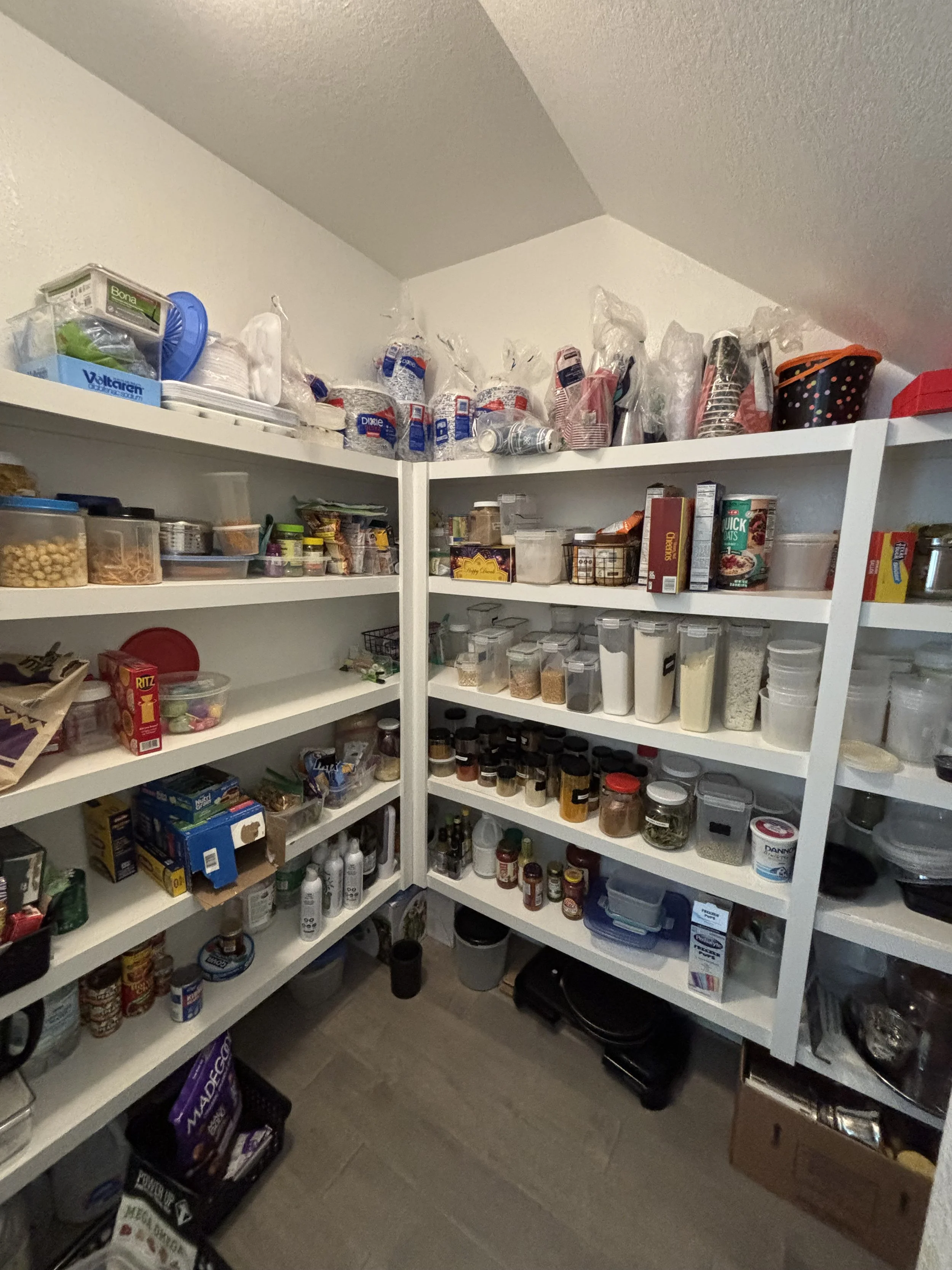 A cluttered pantry can make meal prep and everyday routines more difficult. This pantry was decluttered, categorized, and reorganized to create designated zones for snacks, canned goods, baking supplies, and everyday essentials. A simple, functional 