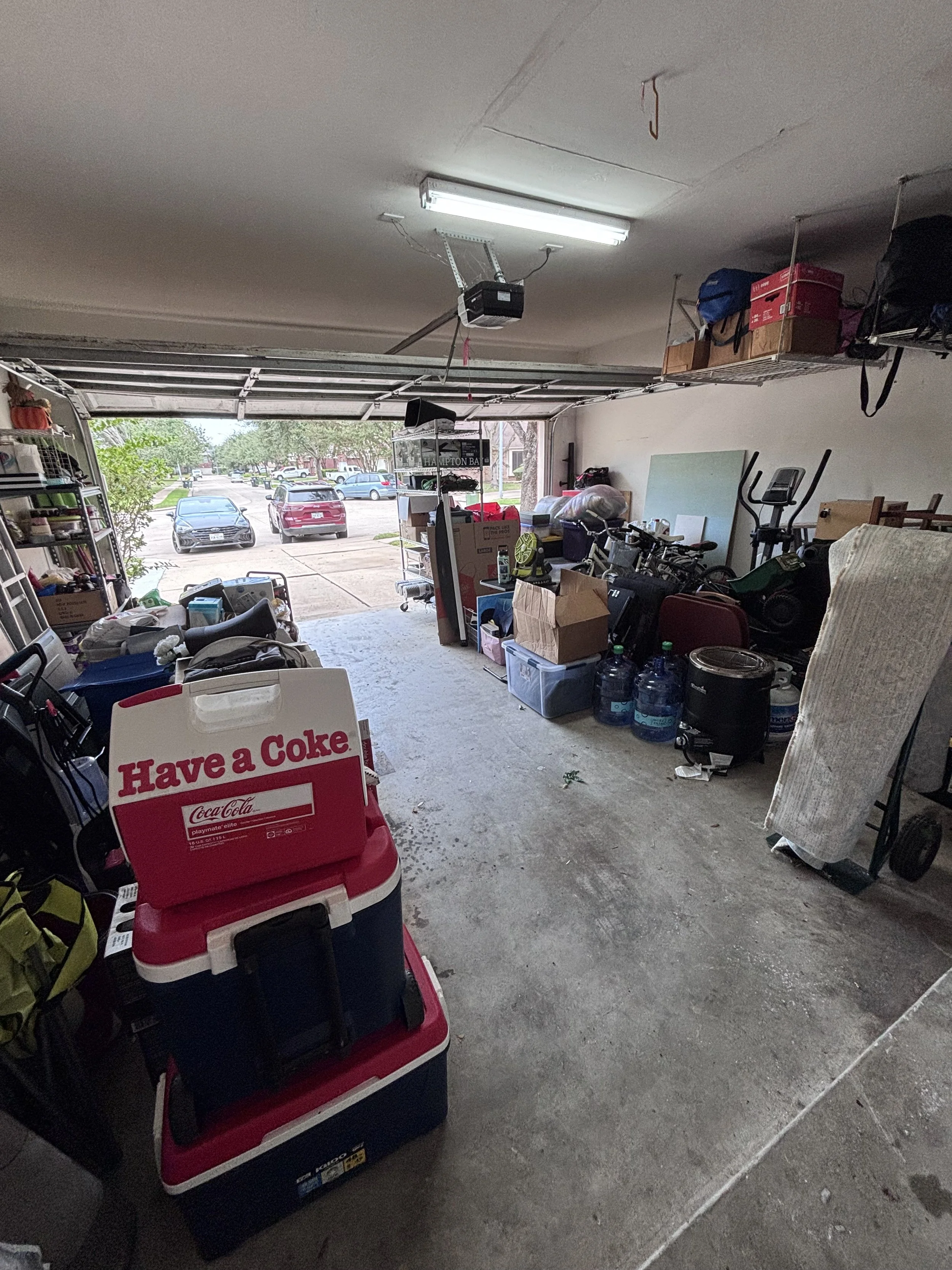 Declutter the garage by creating zones that allow you to find items more quickly and a place to park your vehicles. Creating zones allows items to be accessed and put away more quickly. 