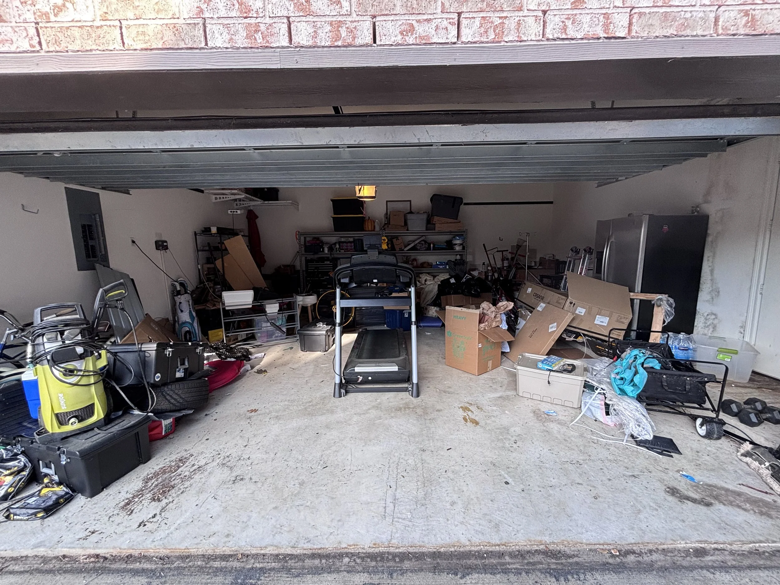 Declutter the garage by creating zones that allow you to find items more quickly and a place to park your vehicles. Creating zones allows items to be accessed and put away more quickly. 