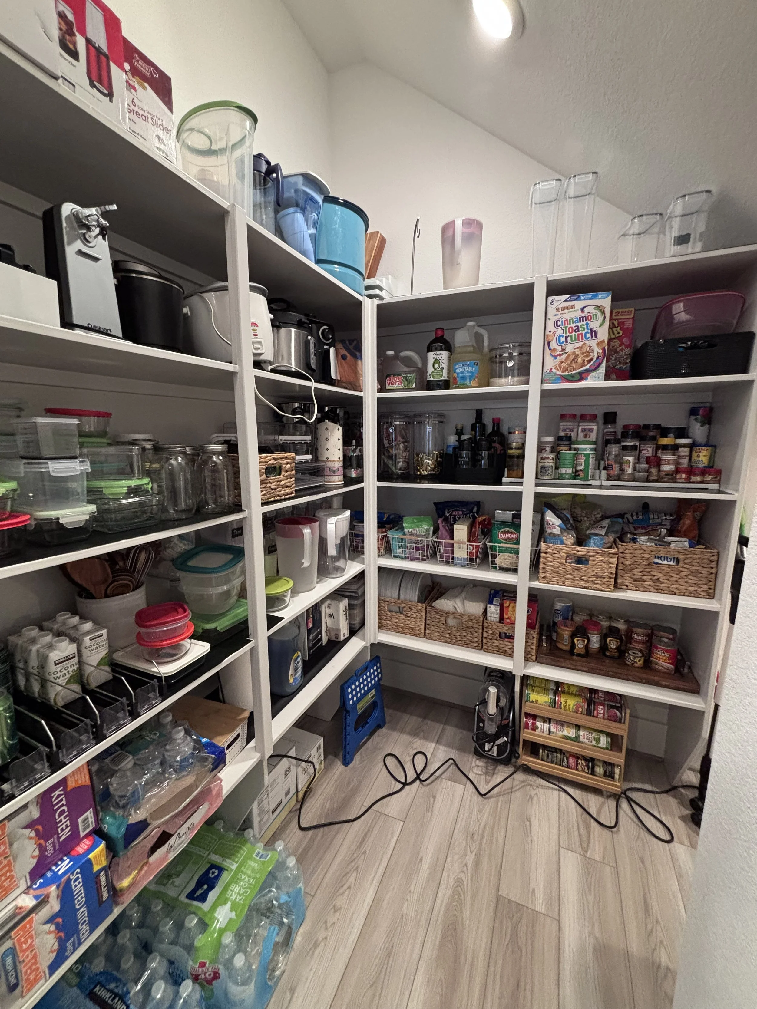 The first step in creating an organized pantry is knowing what actually needs to stay. We started by decluttering unused and expired items, then grouped, contained, labeled, and organized everything that remained. The result? A pantry that is easier 