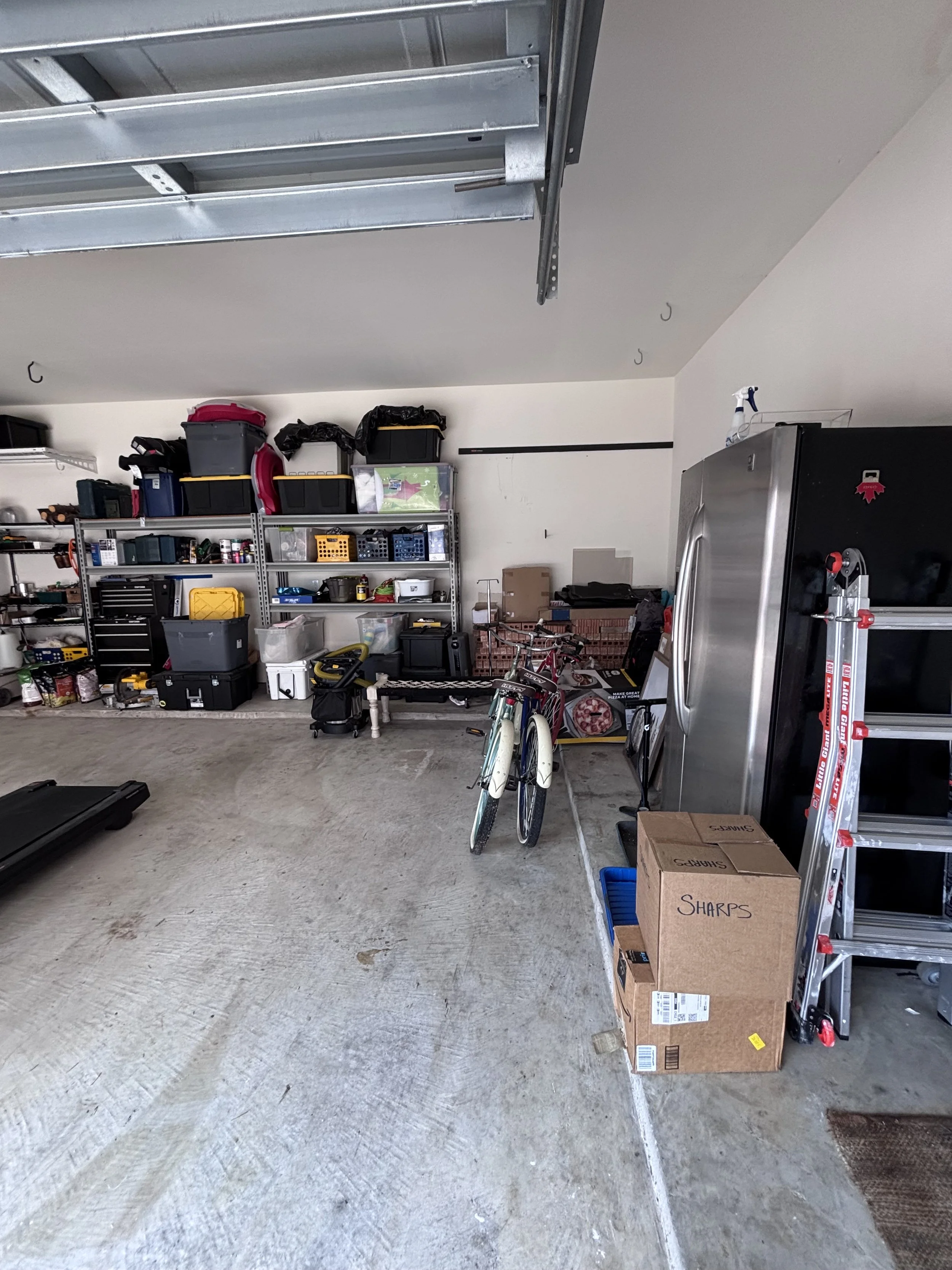 Declutter the garage by creating zones that allow you to find items more quickly and a place to park your vehicles. Creating zones allows items to be accessed and put away more quickly. 