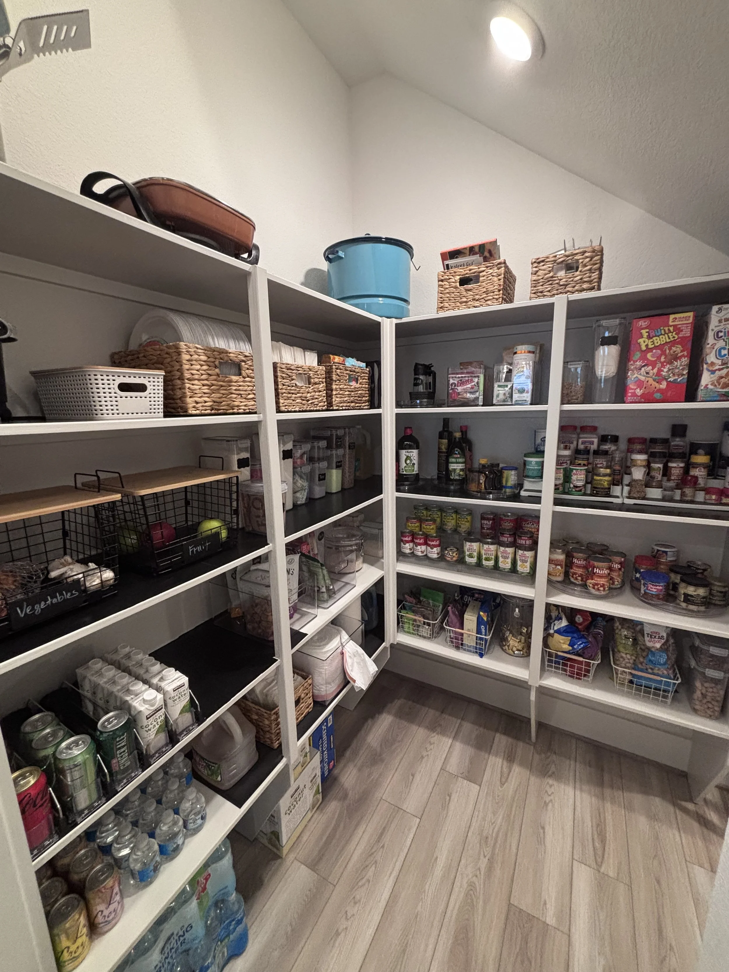 The first step in creating an organized pantry is knowing what actually needs to stay. We started by decluttering unused and expired items, then grouped, contained, labeled, and organized everything that remained. The result? A pantry that is easier 