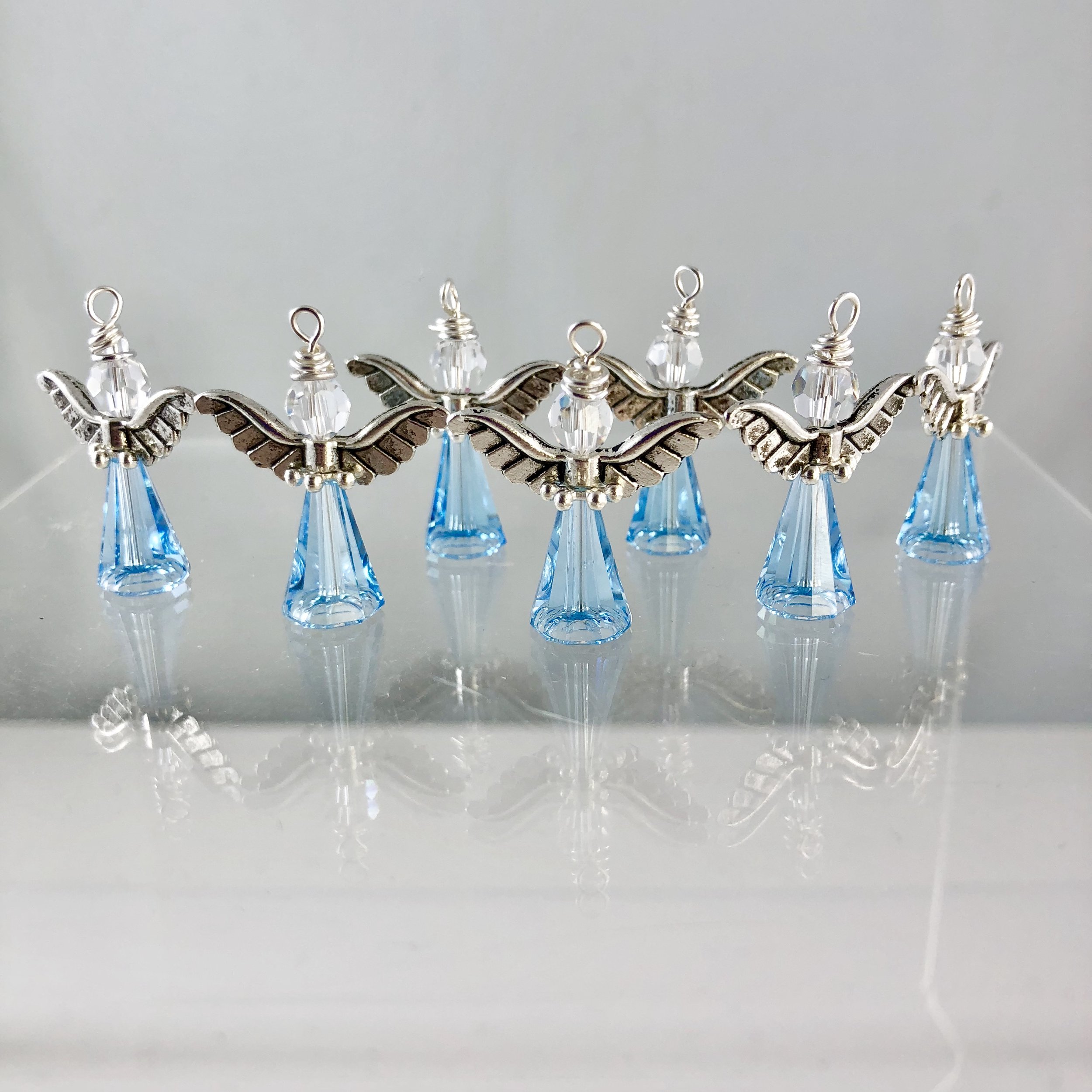 Collection of small light blue angels
