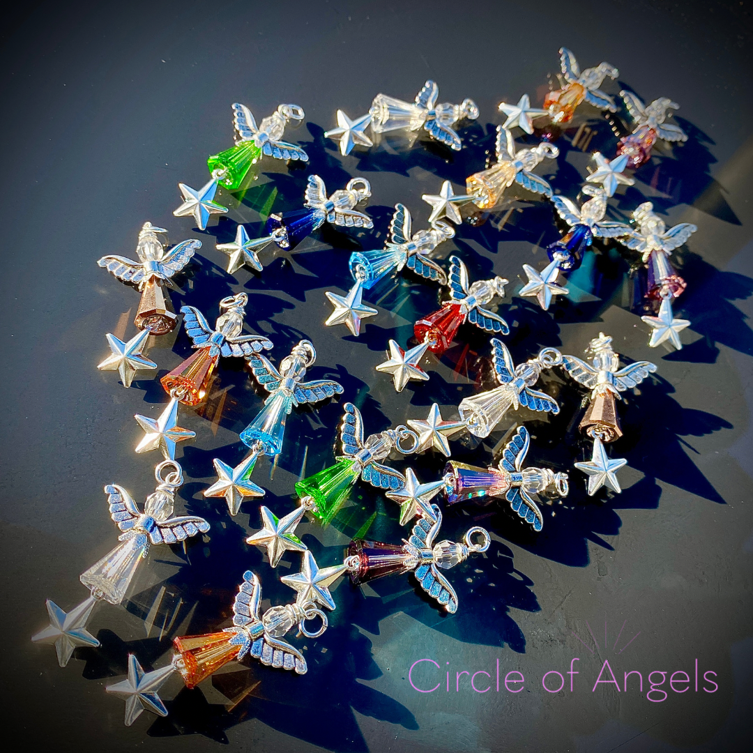Assorted small angel charms with star dangles