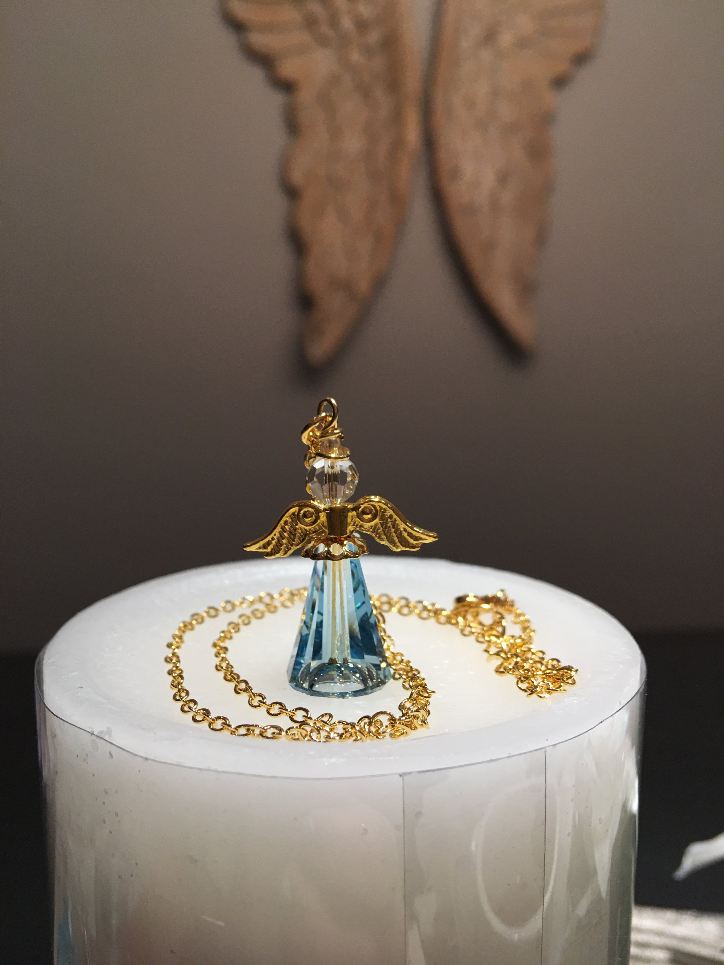 Light blue angel necklace