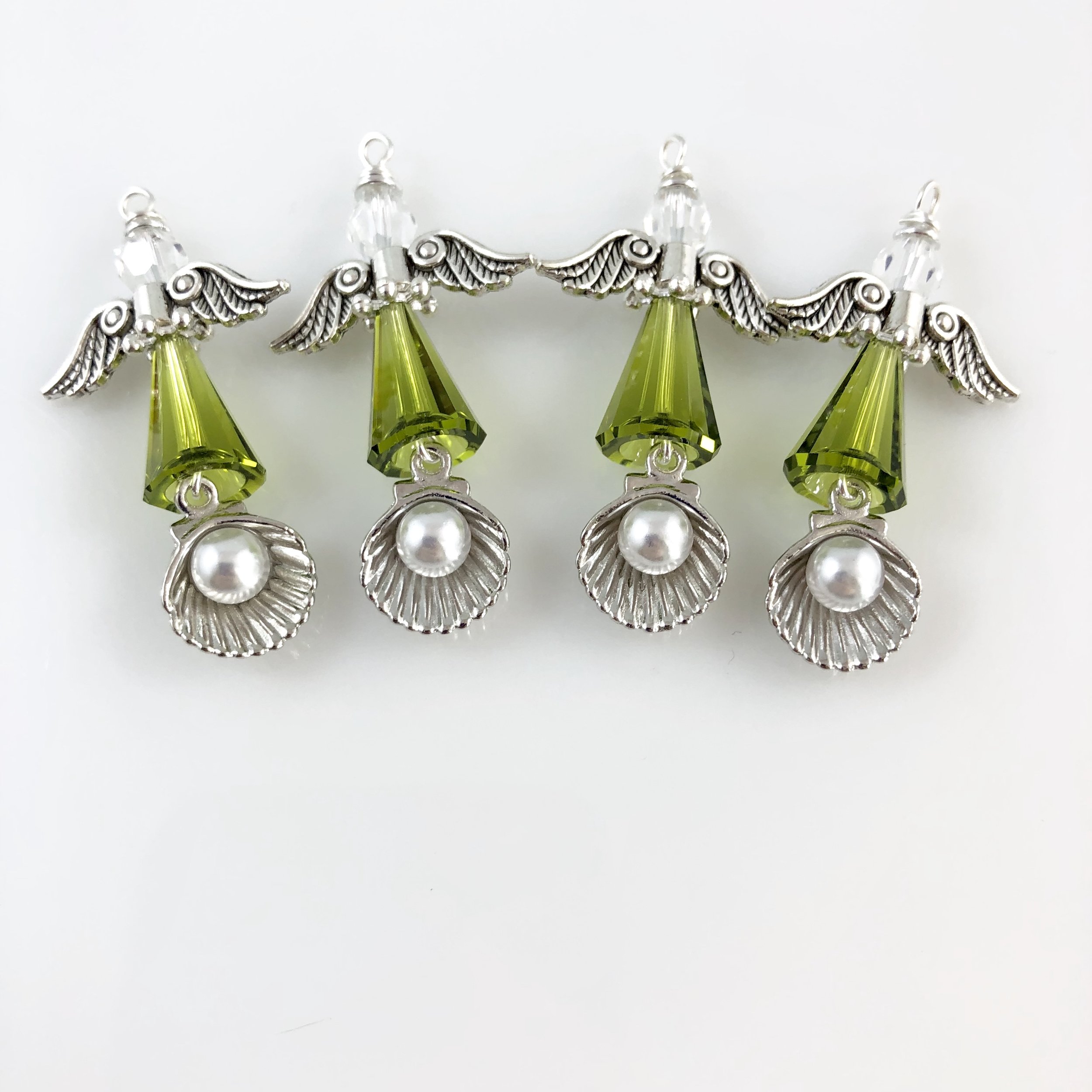 Small olive green angels with shell/pearl charms in memory of a beloved grandmother