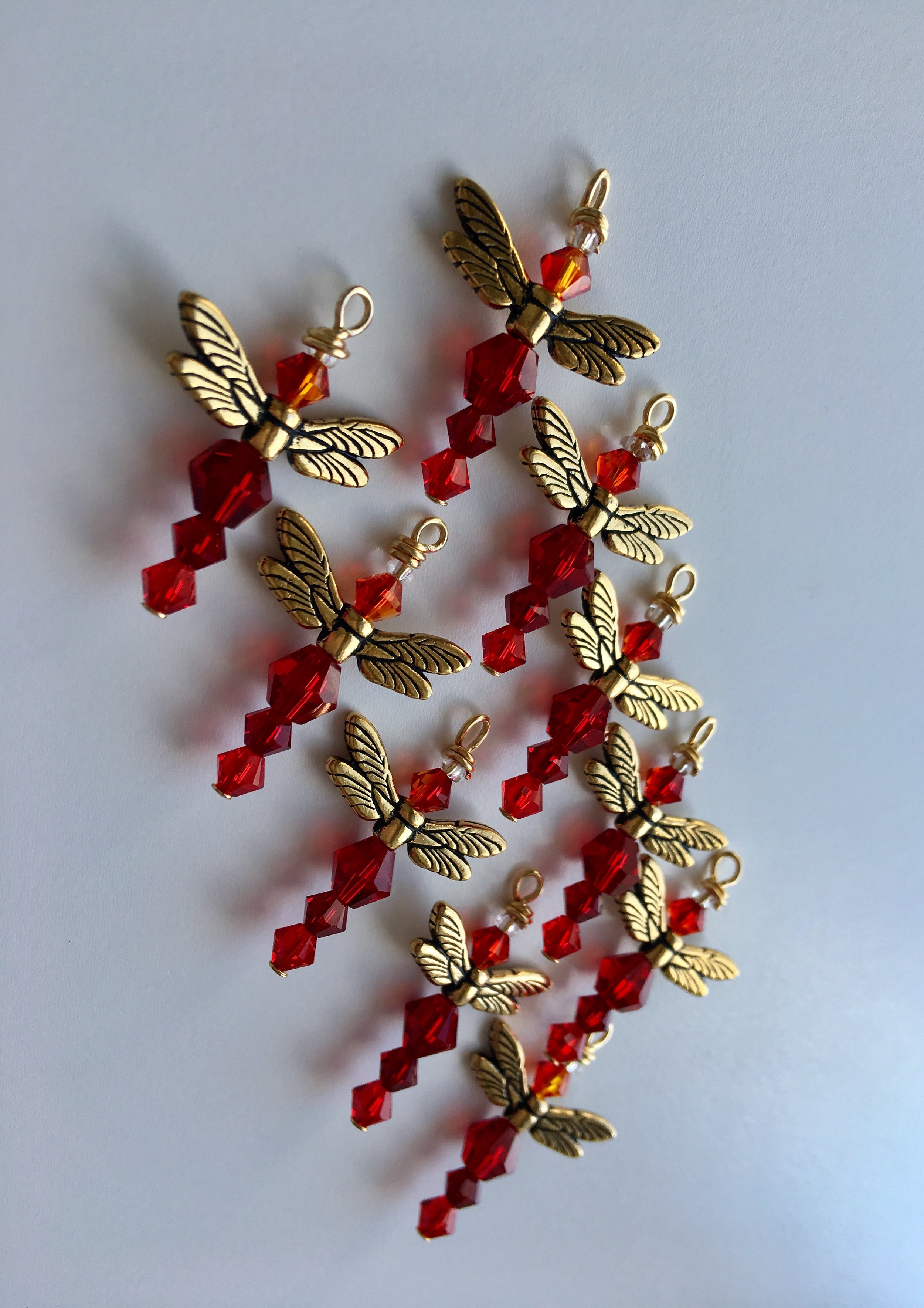 Red and gold Friendship Dragonflies