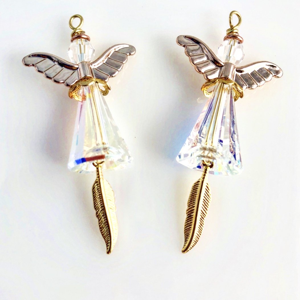 Iridescent angels with rose gold wings and golden wing feather