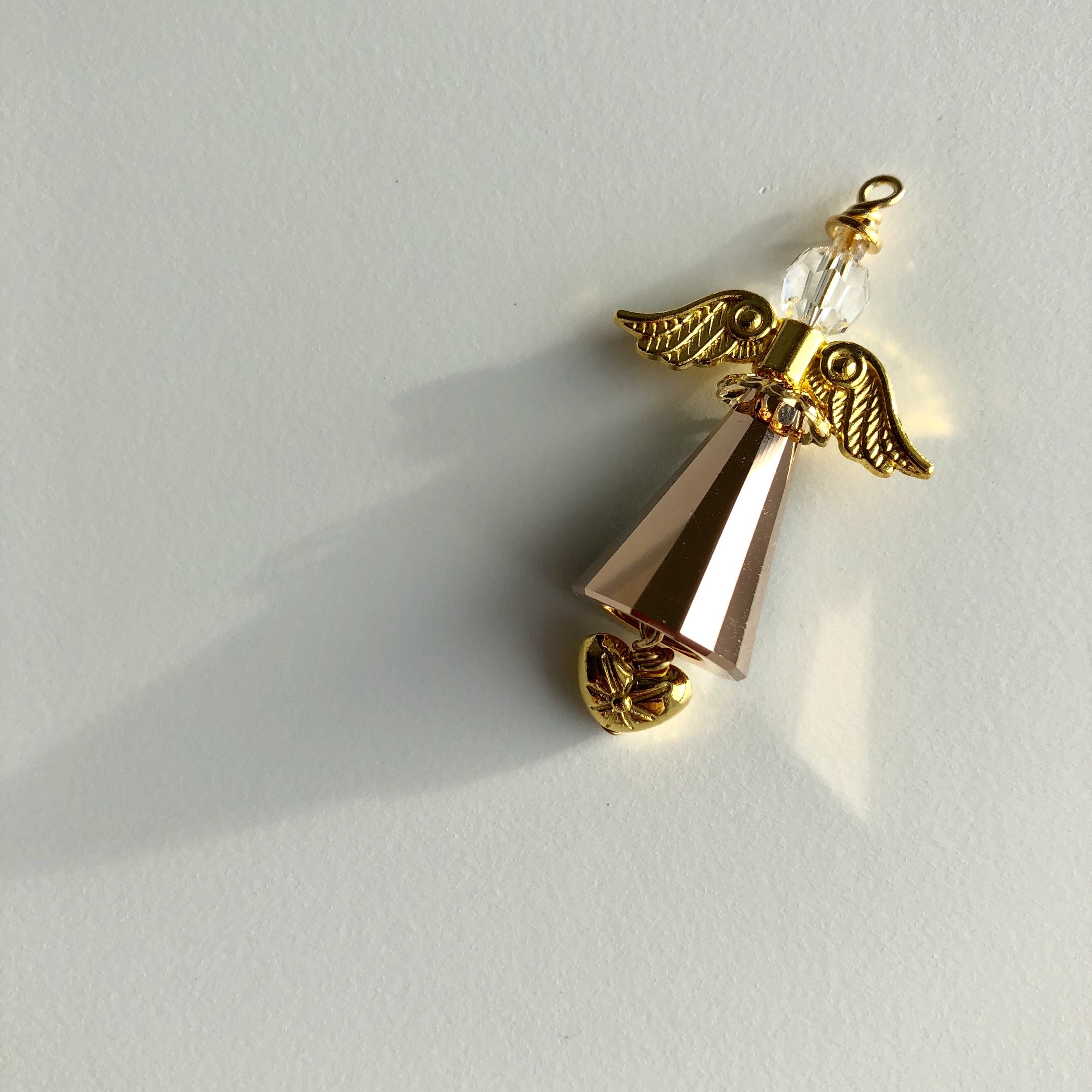 Large champagne angel with etched heart charm