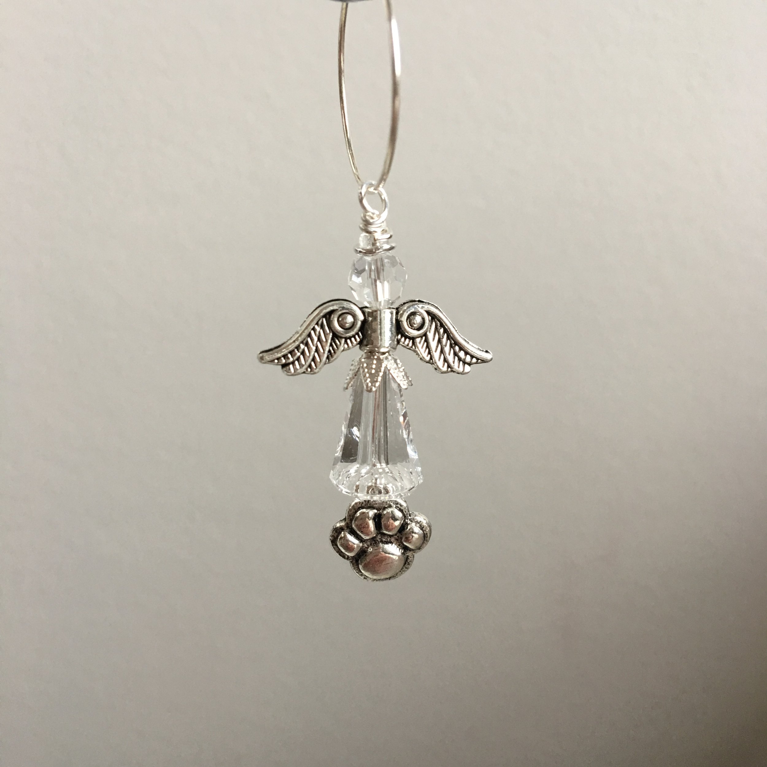 Small clear angel with paw print charm for a beloved dog friend