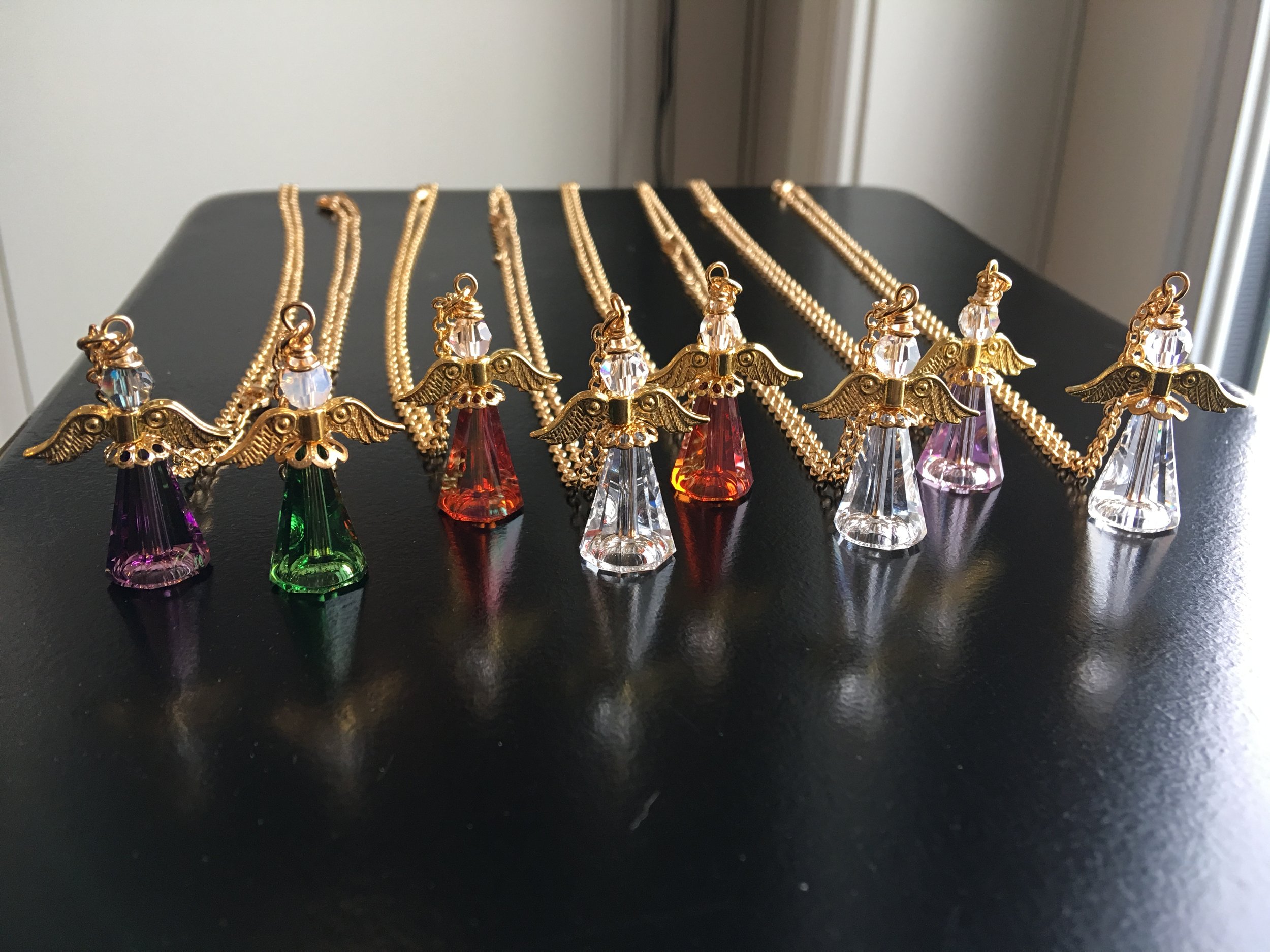 Assorted angel necklaces
