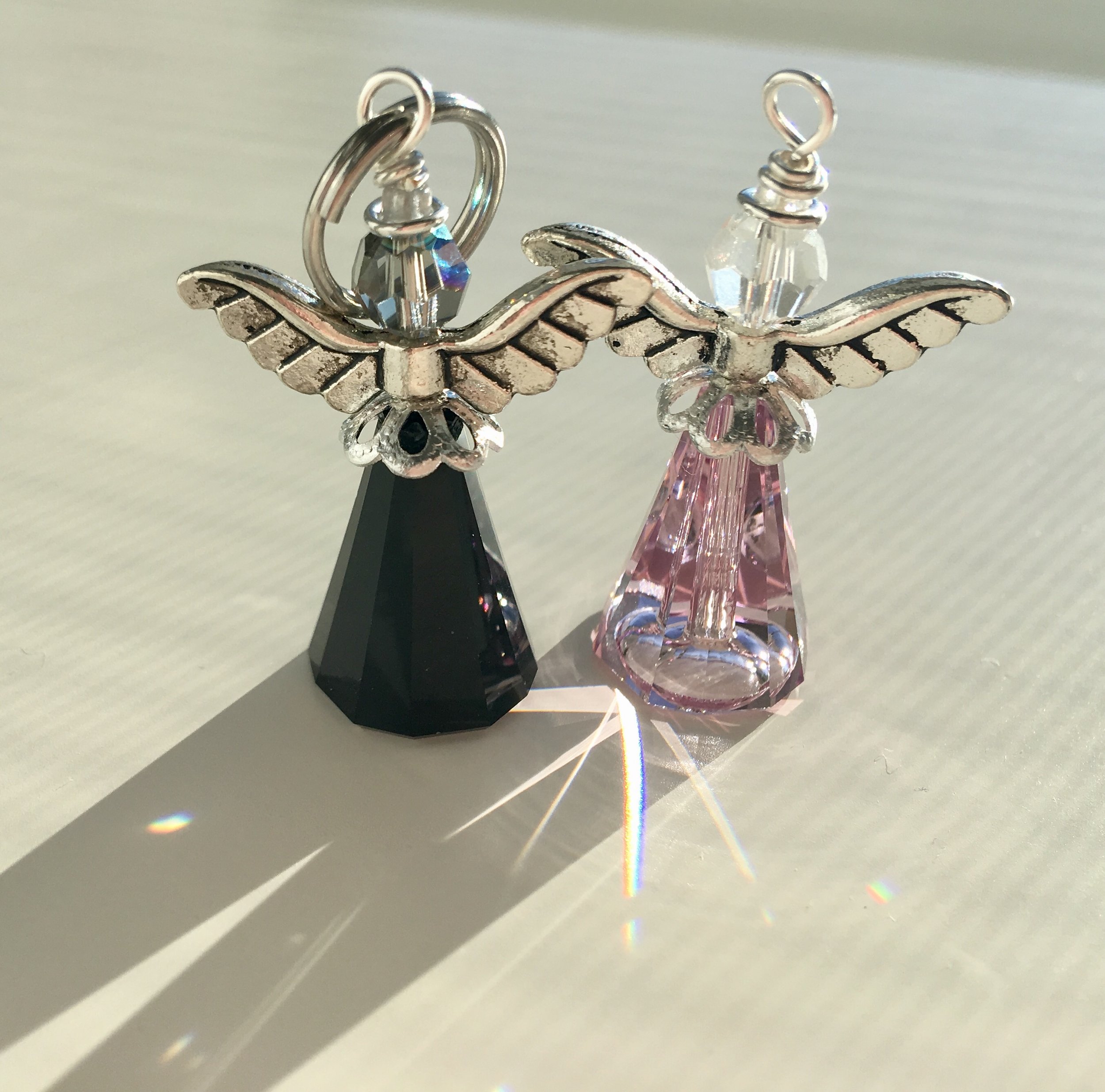 Black and light pink angel