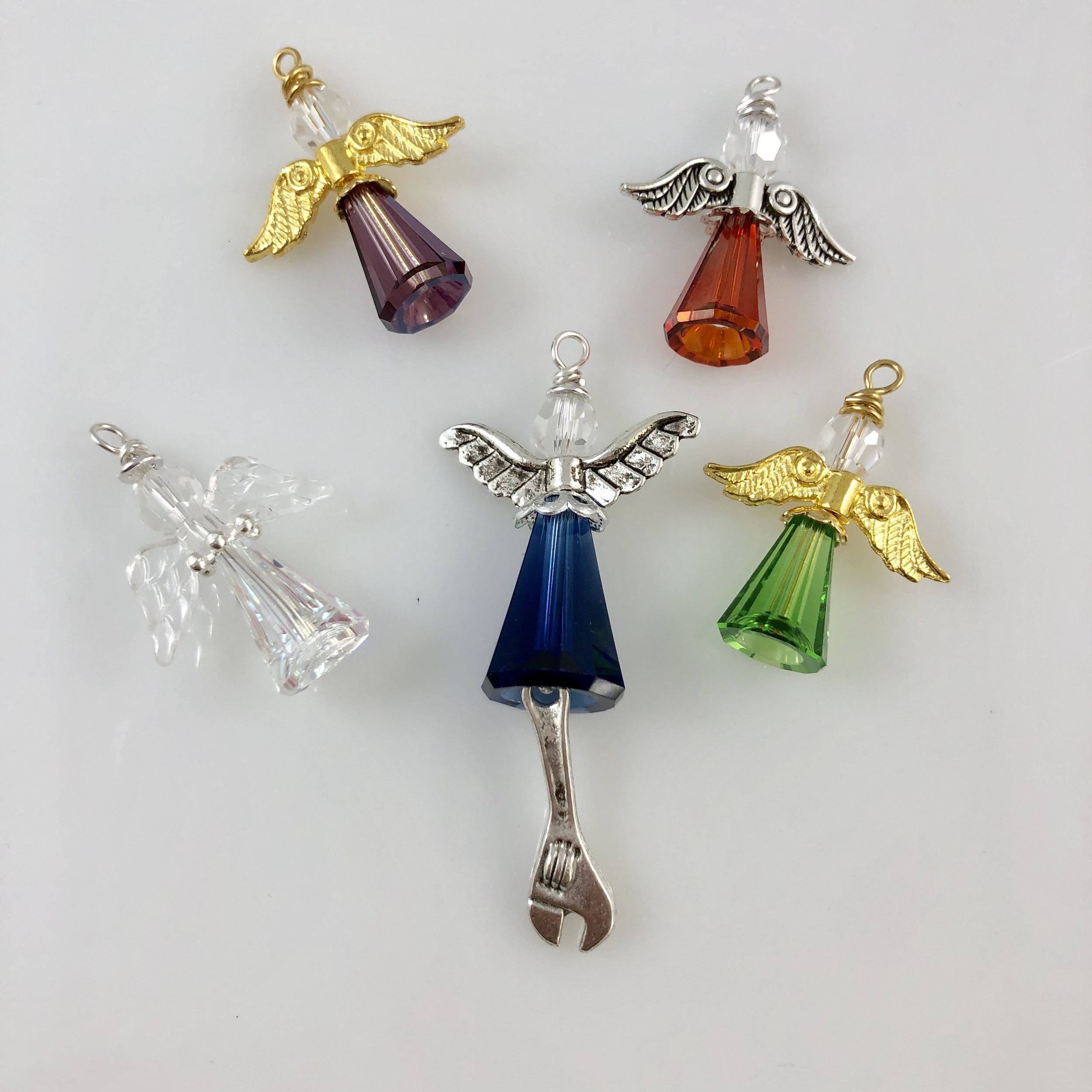 Assorted angels (one with wrench charm to honour a lost loved one who was a mechanic