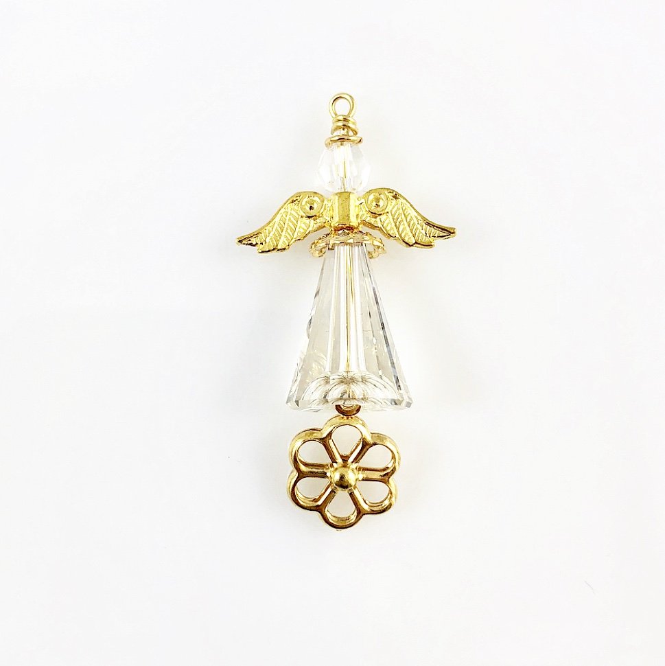 Large clear angel with gold wings and flower charm