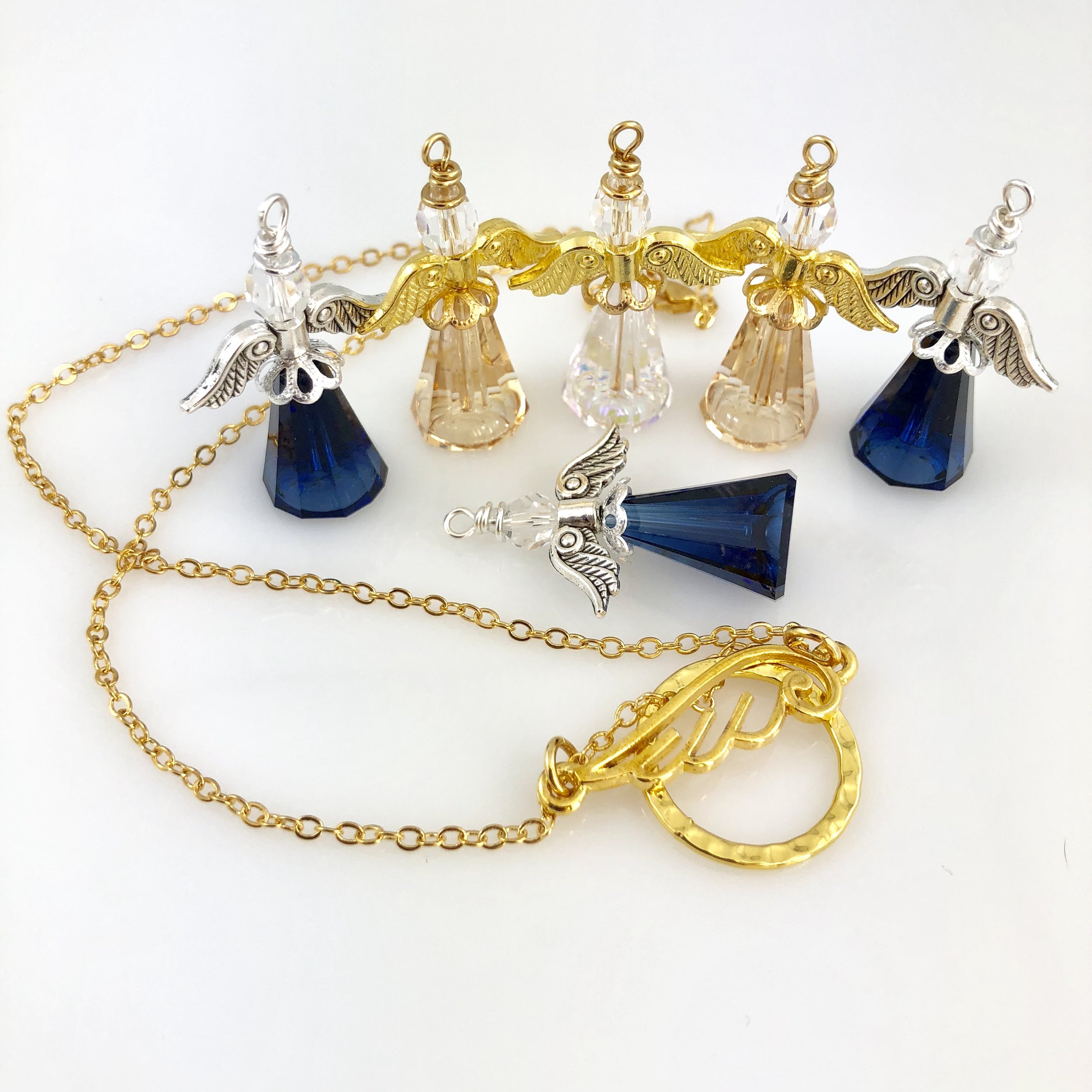 Assorted angels and angel necklace