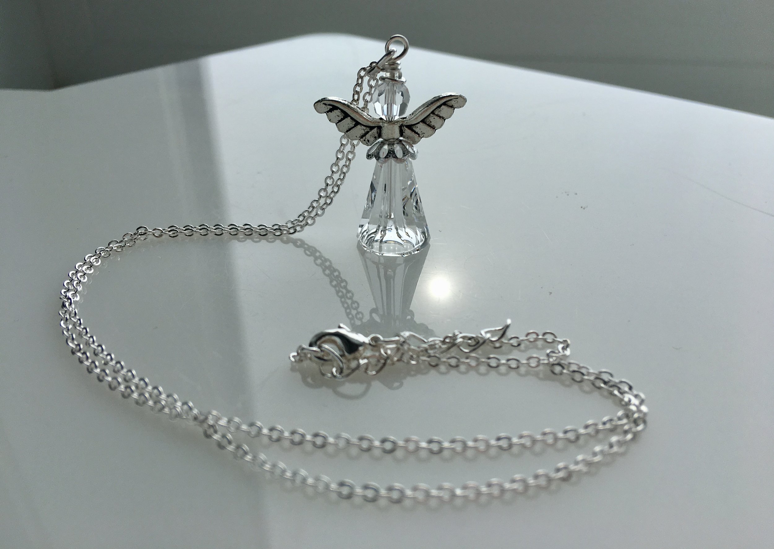 Clear angel necklace