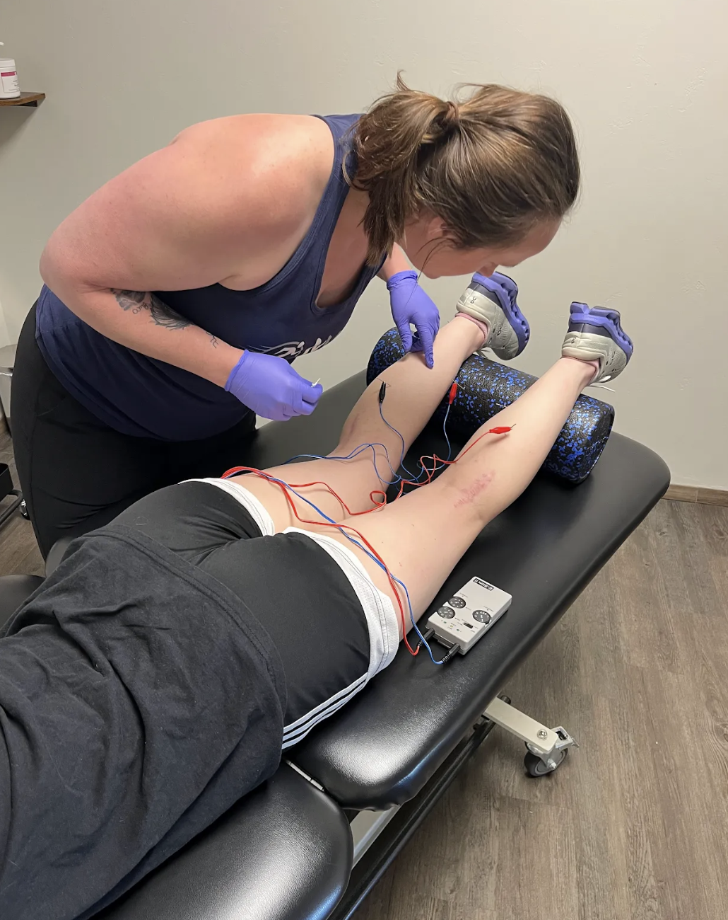 MVMT Performance & Rehabilitation clinician performing dry needling in Green Bay on a client