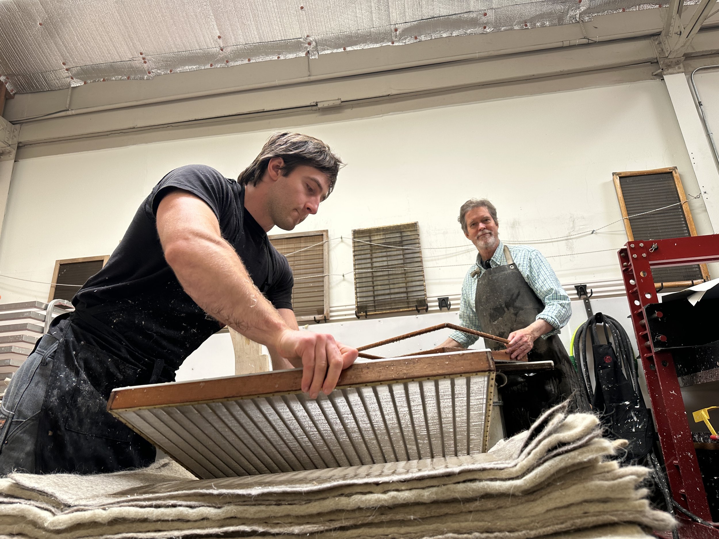 Max Thill and Donald Farnsworth making 18 x 24in. laid paper. Photo Credit: Guy Diehl