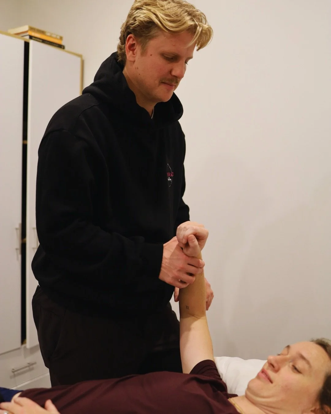 Shoulder injury, Physiotherapist treating a shoulder injury. ACC