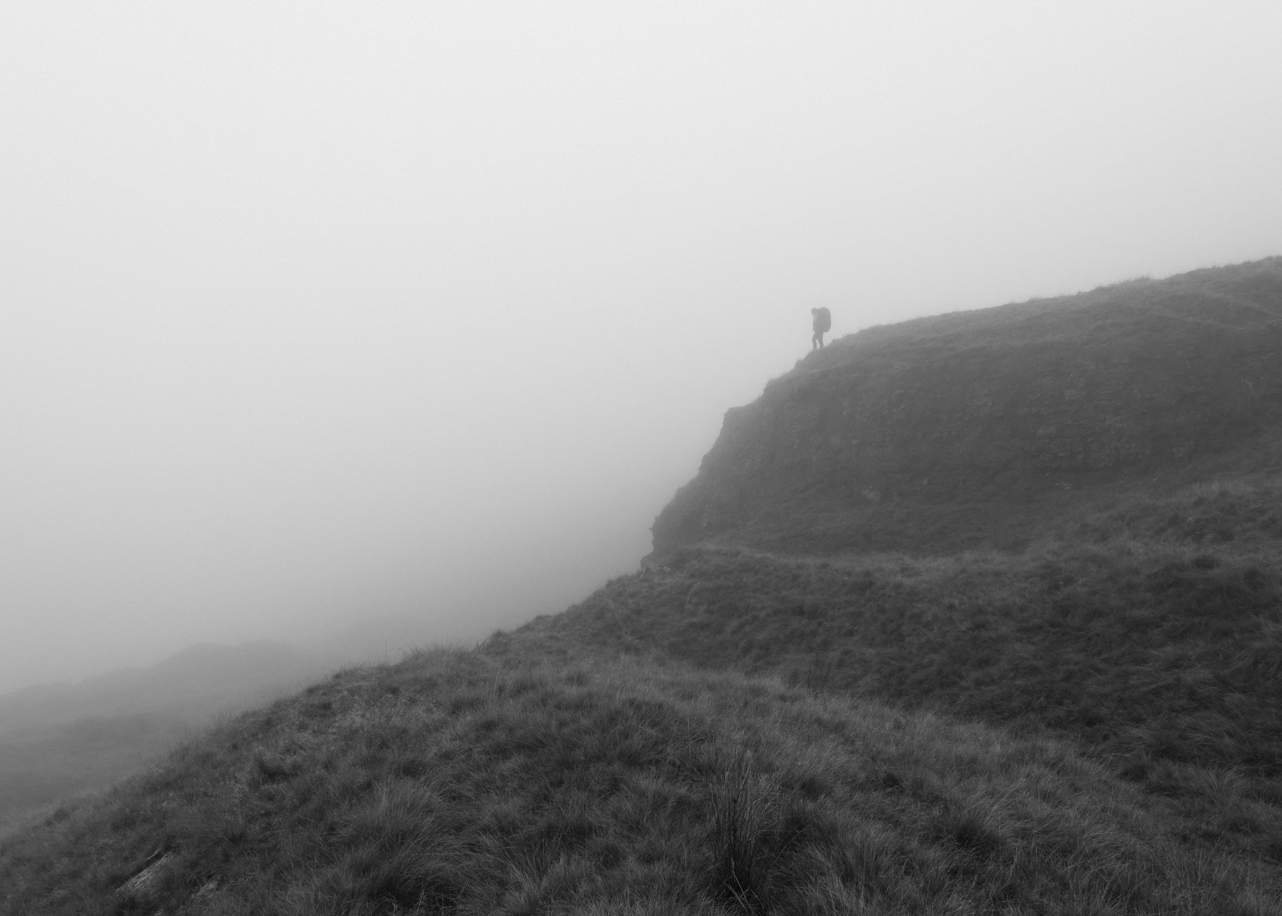 Moody overcast view of Scout Moor in the Southern Pennines, capturing quiet atmosphere for mindful landscape photography.