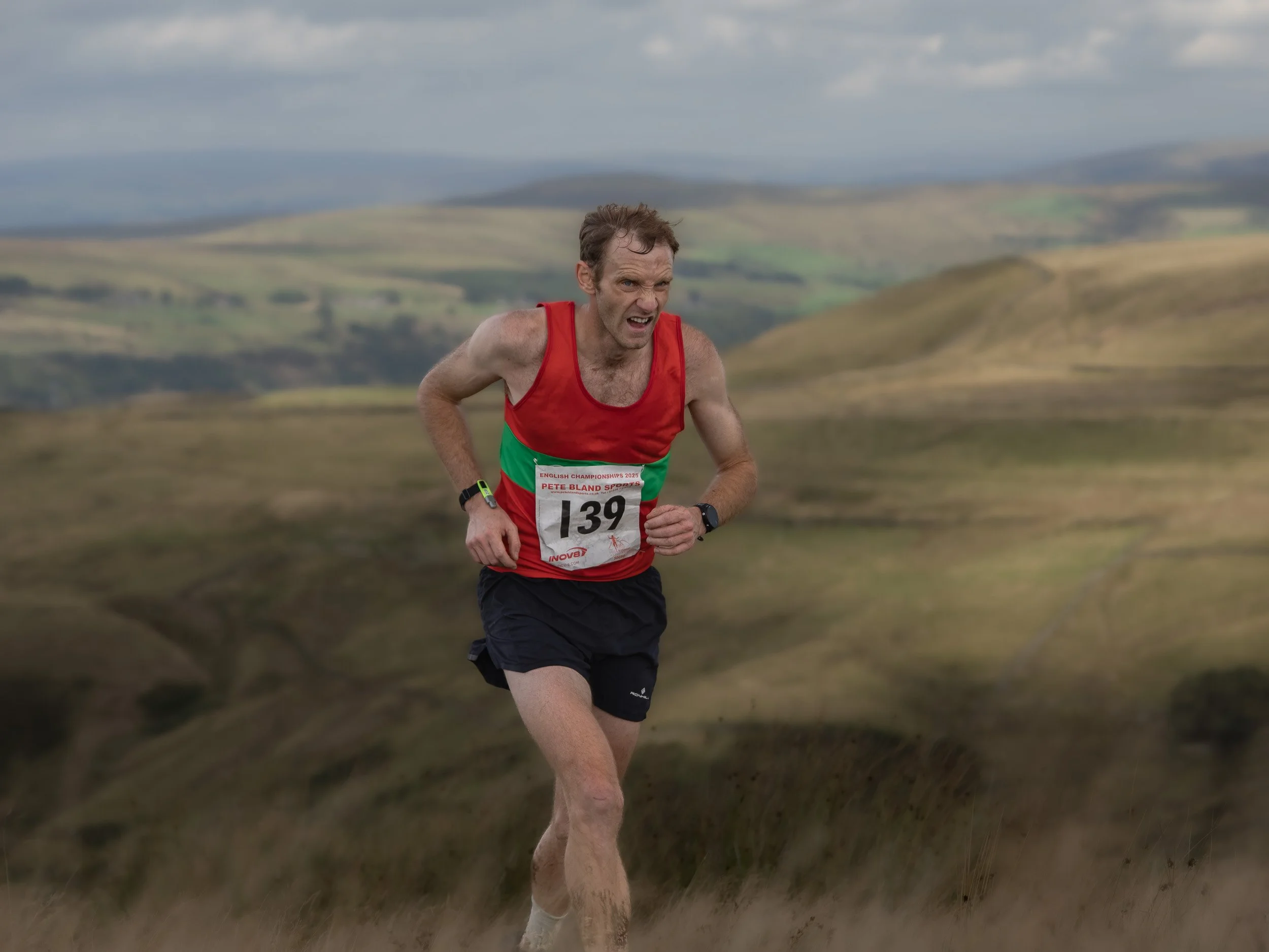 A masterclass in British stoicism: runner 139 fighting the inclines of Scout Moor while pretending everything is completely fine.
