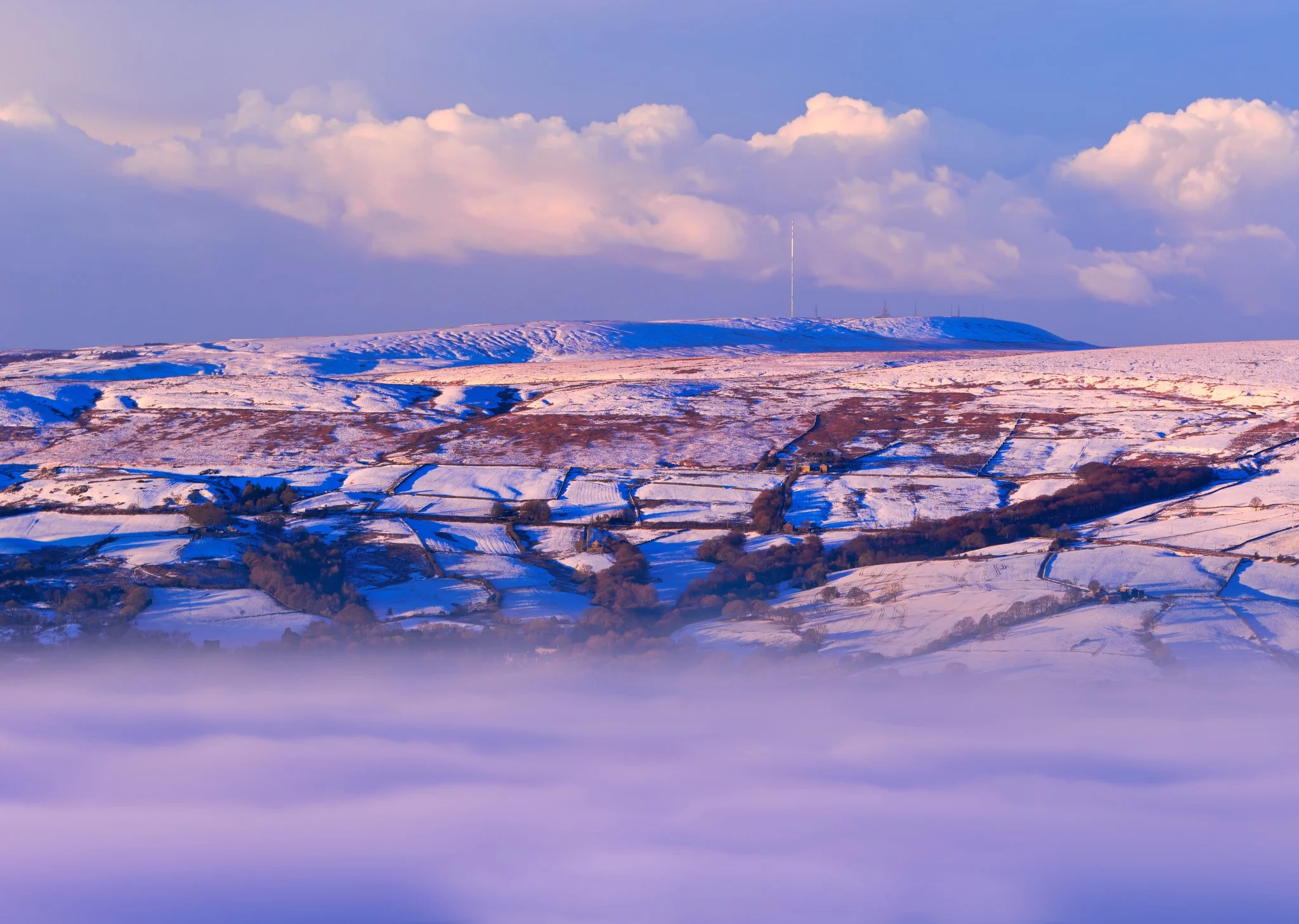 Irwell Valley temperature inversion — a sea of mist drapes the valley floor, with hilltops emerging like islands in an ethereal swell.