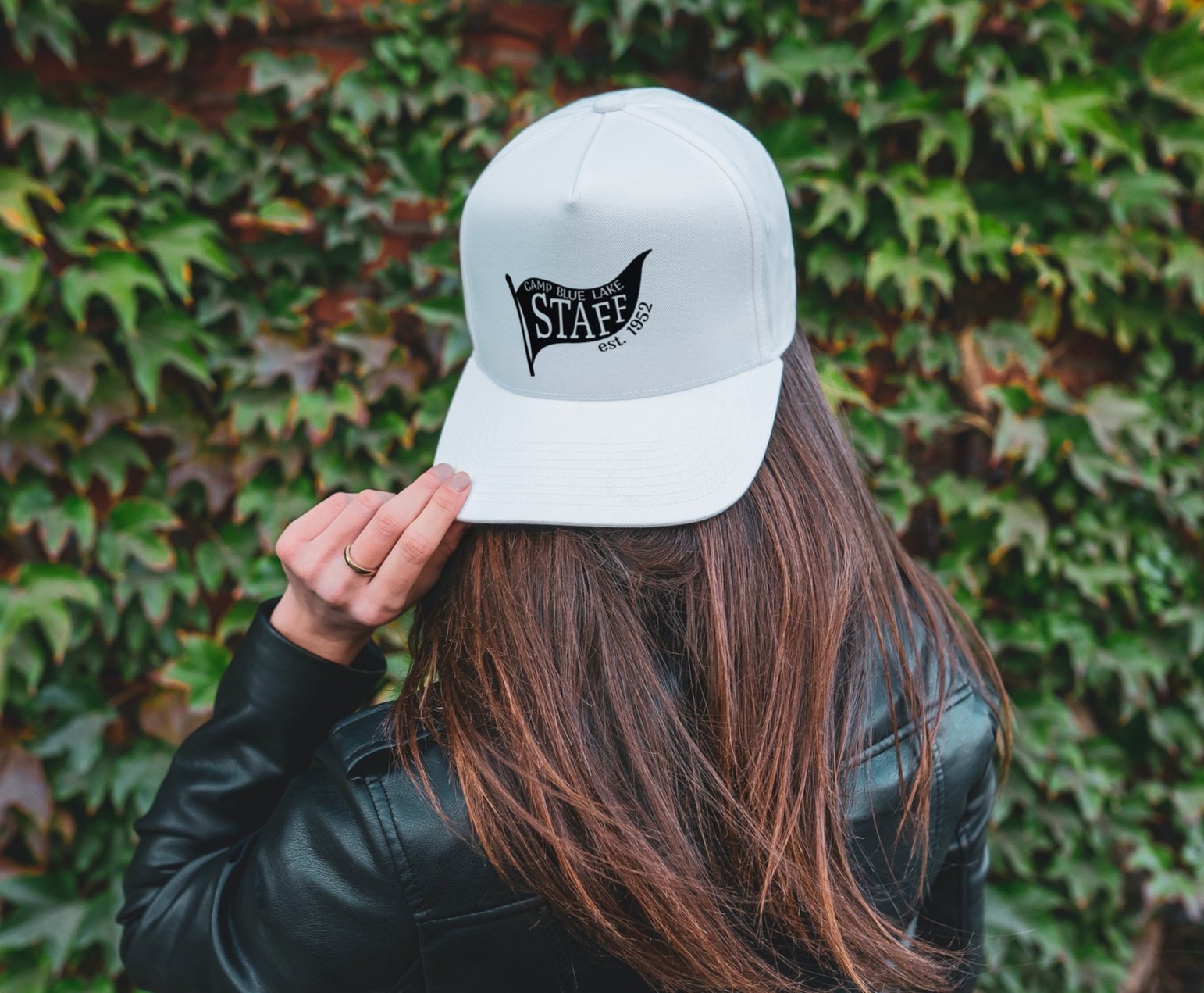 Brunette+woman+wearing+a+cap+outdoors_BL+Staff+-+Flag+2.jpg