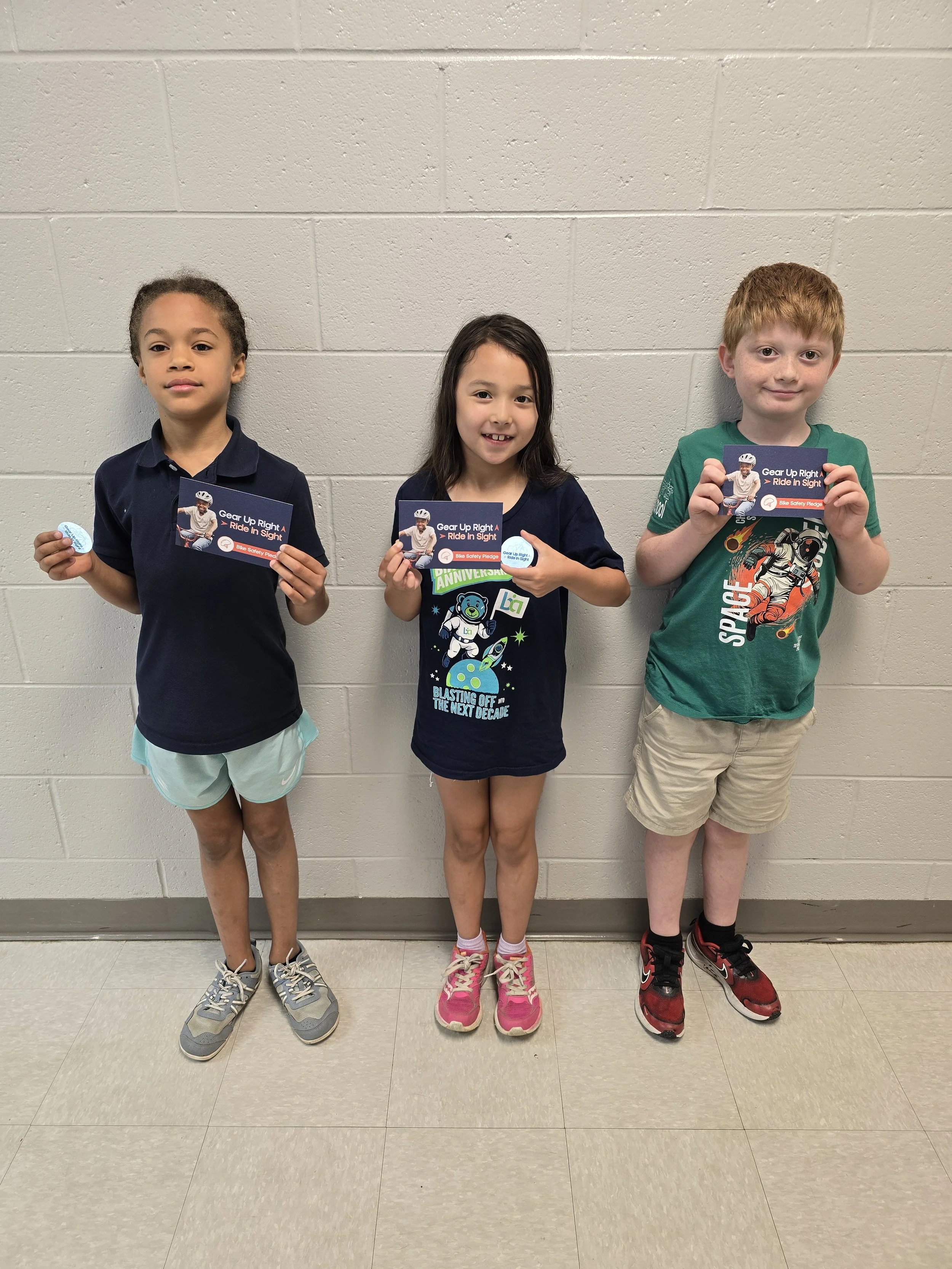 BIA Charter School Students with Pledge Cards.jpg