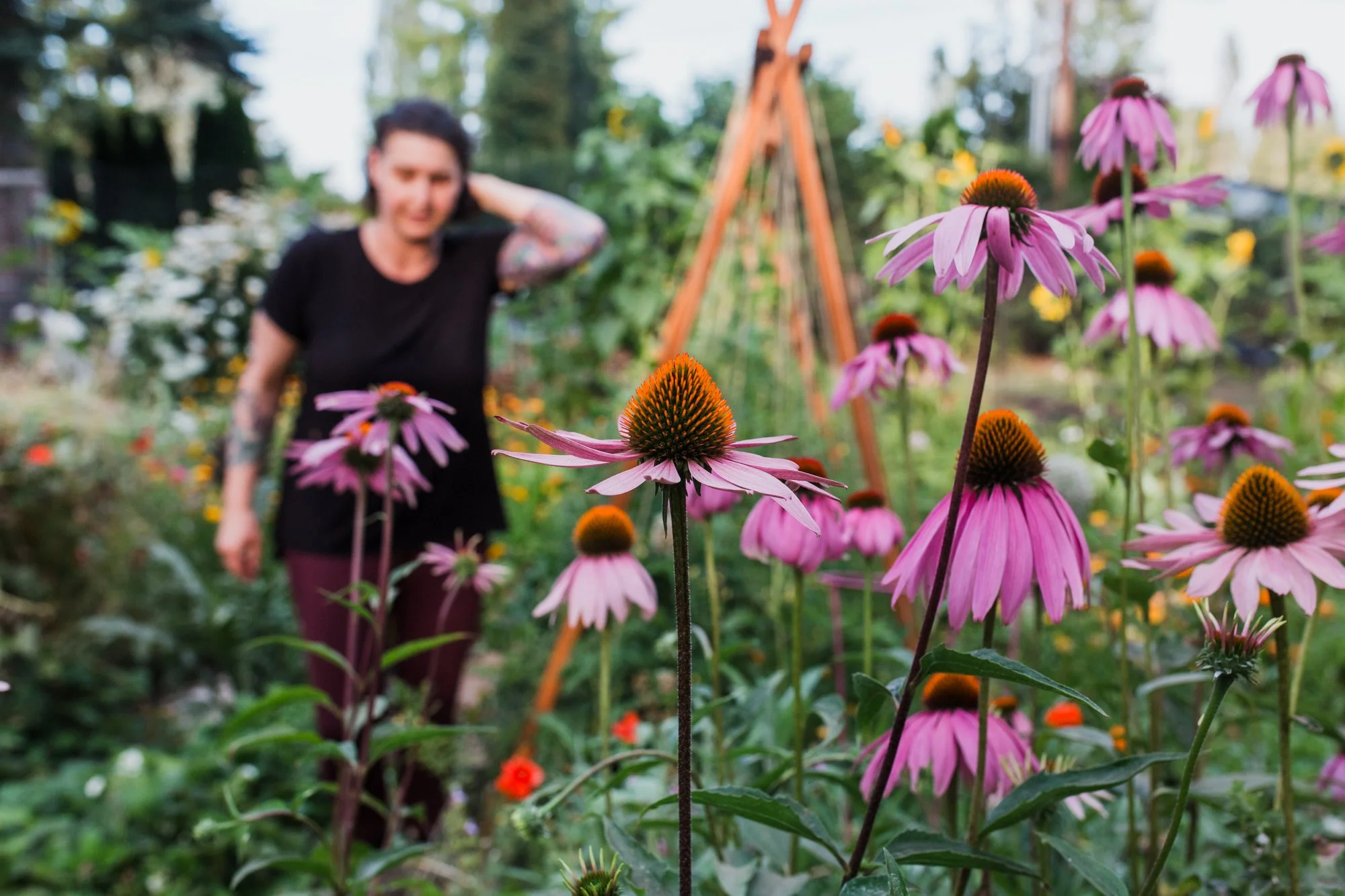 Woman walking through her garden in Lynnwood