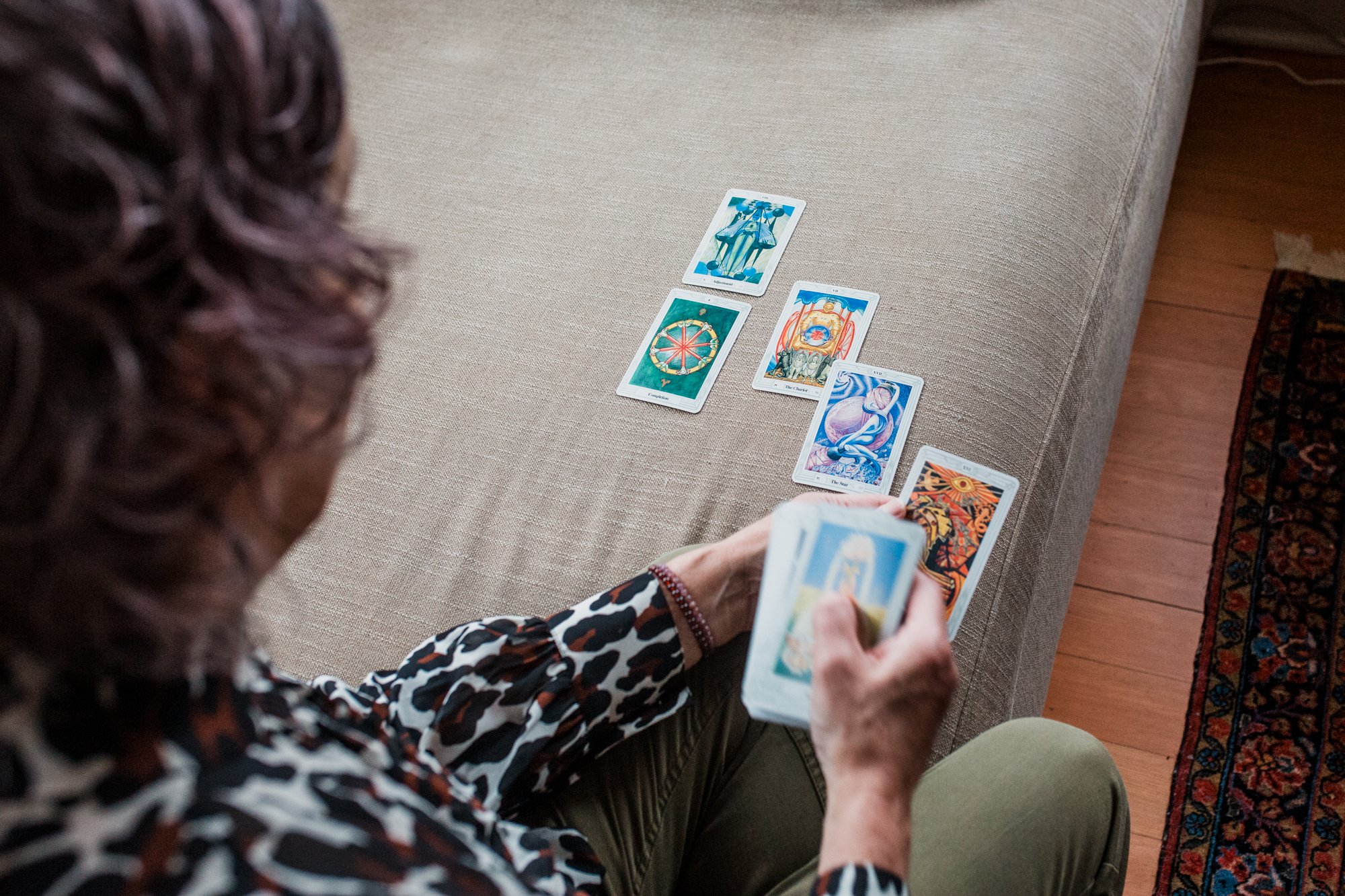 Tarot cards being flipped over by reader
