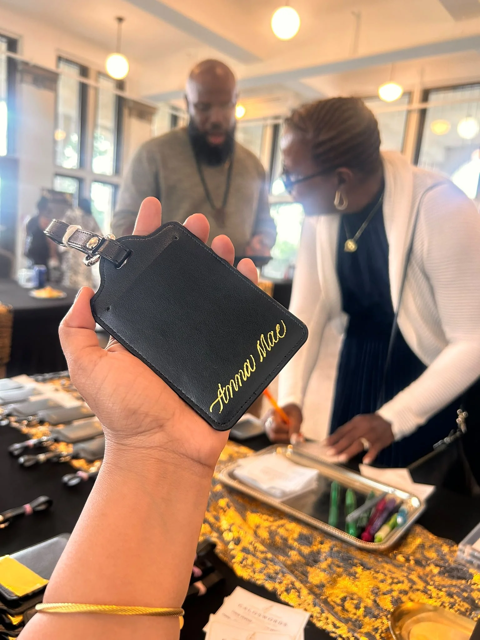 Live Leather Luggage Tag Foiling for a Corporate Event in Detroit