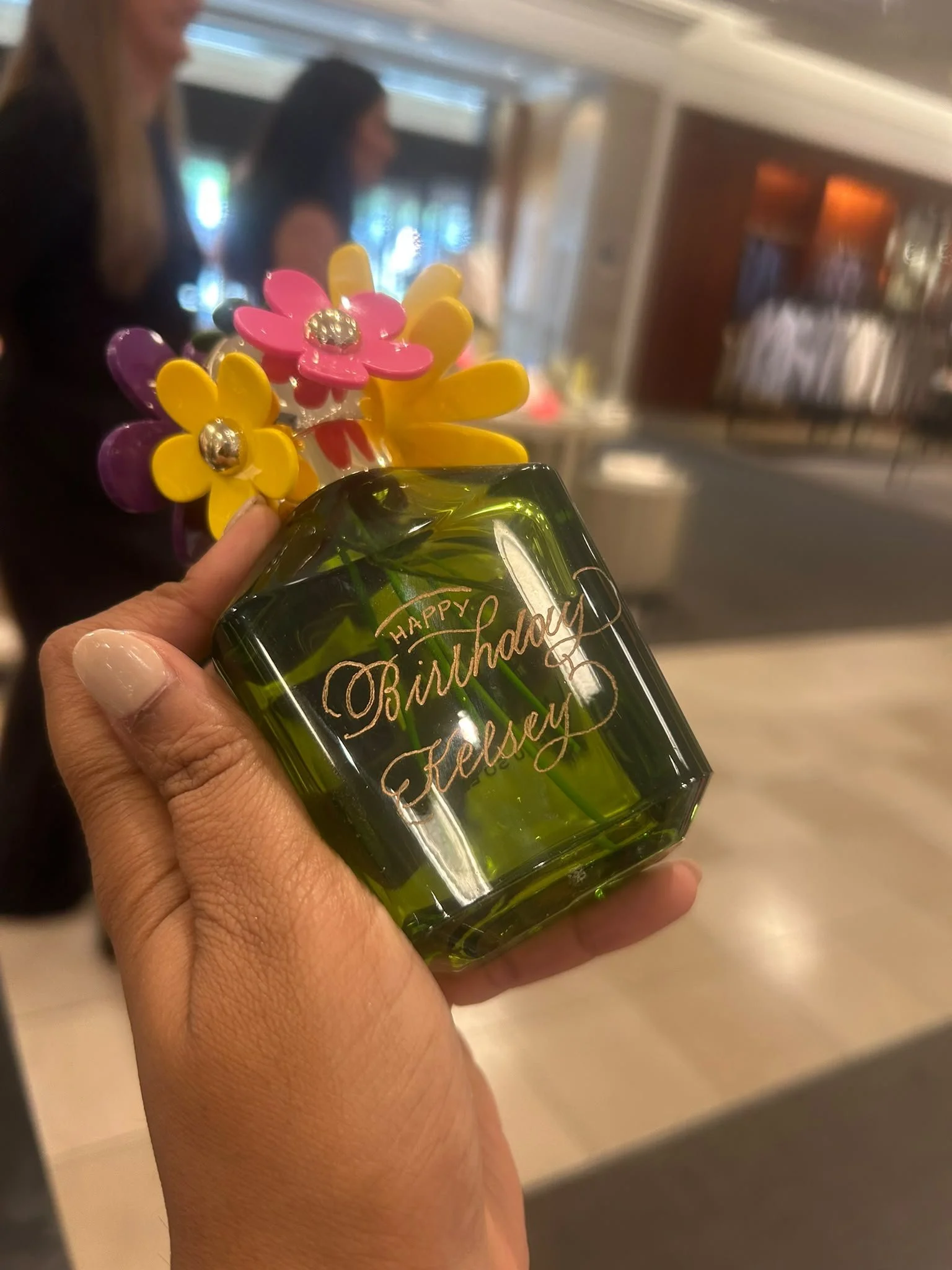 Live event engraving of personalized on a luxury product during an in-store brand activation.