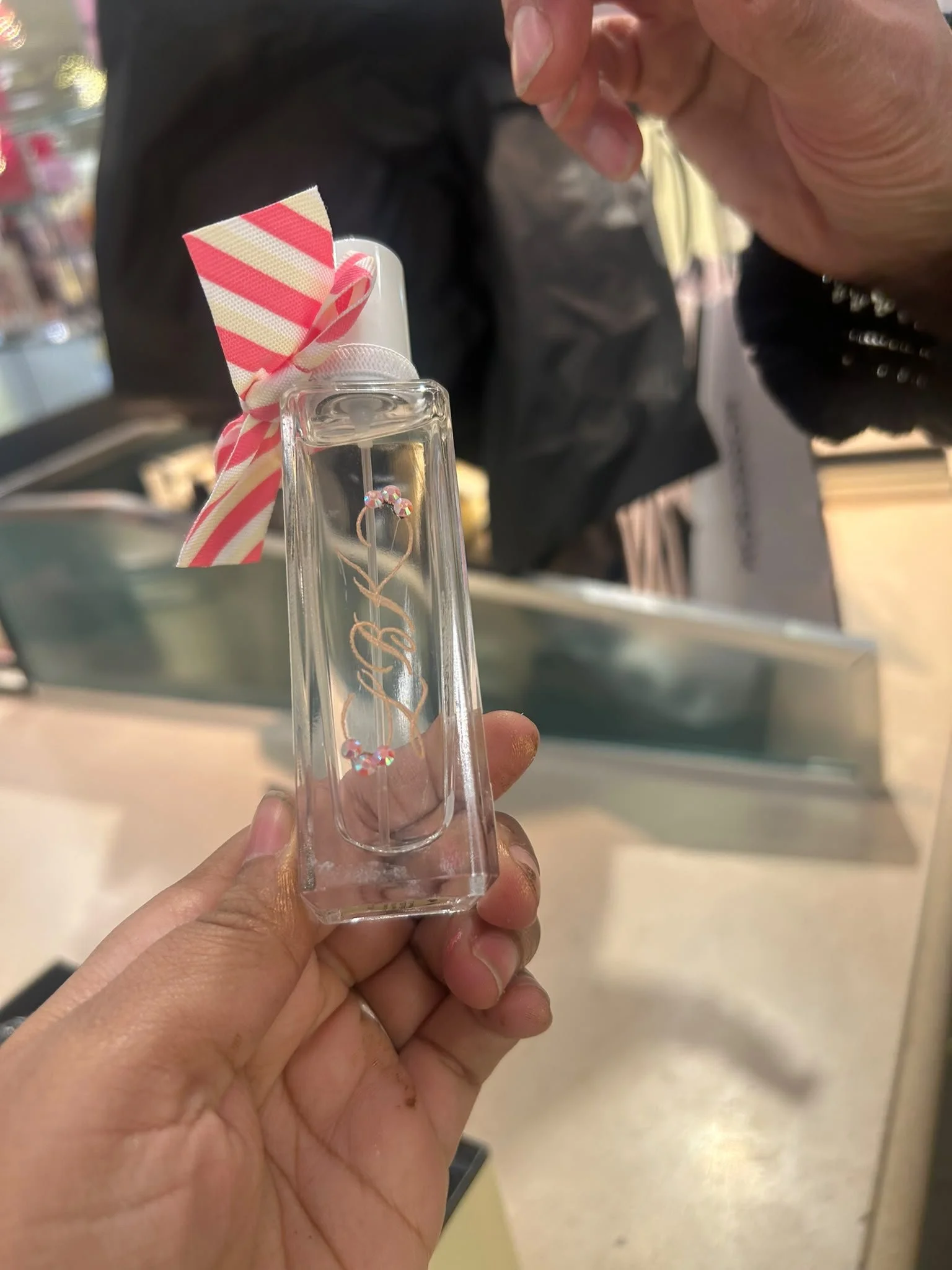Live event engraving of personalized on a luxury product during an in-store brand activation.