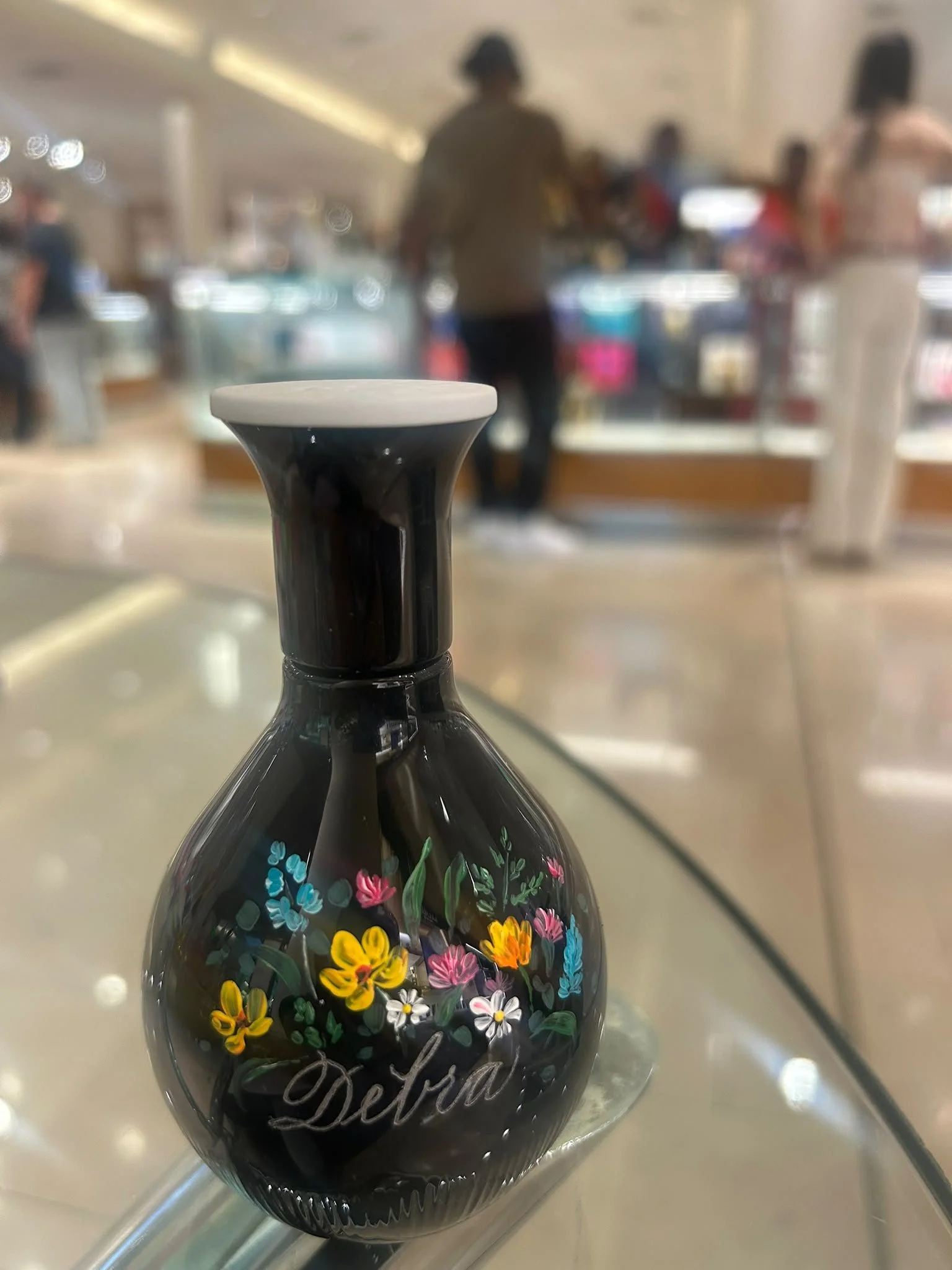 Live event engraving of personalized on a luxury product during an in-store brand activation.