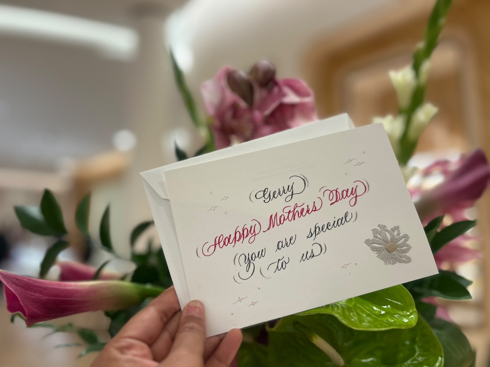 Handwritten Mother's Day card created with live calligraphy during a Cartier luxury retail event in Detroit by Caloswords.