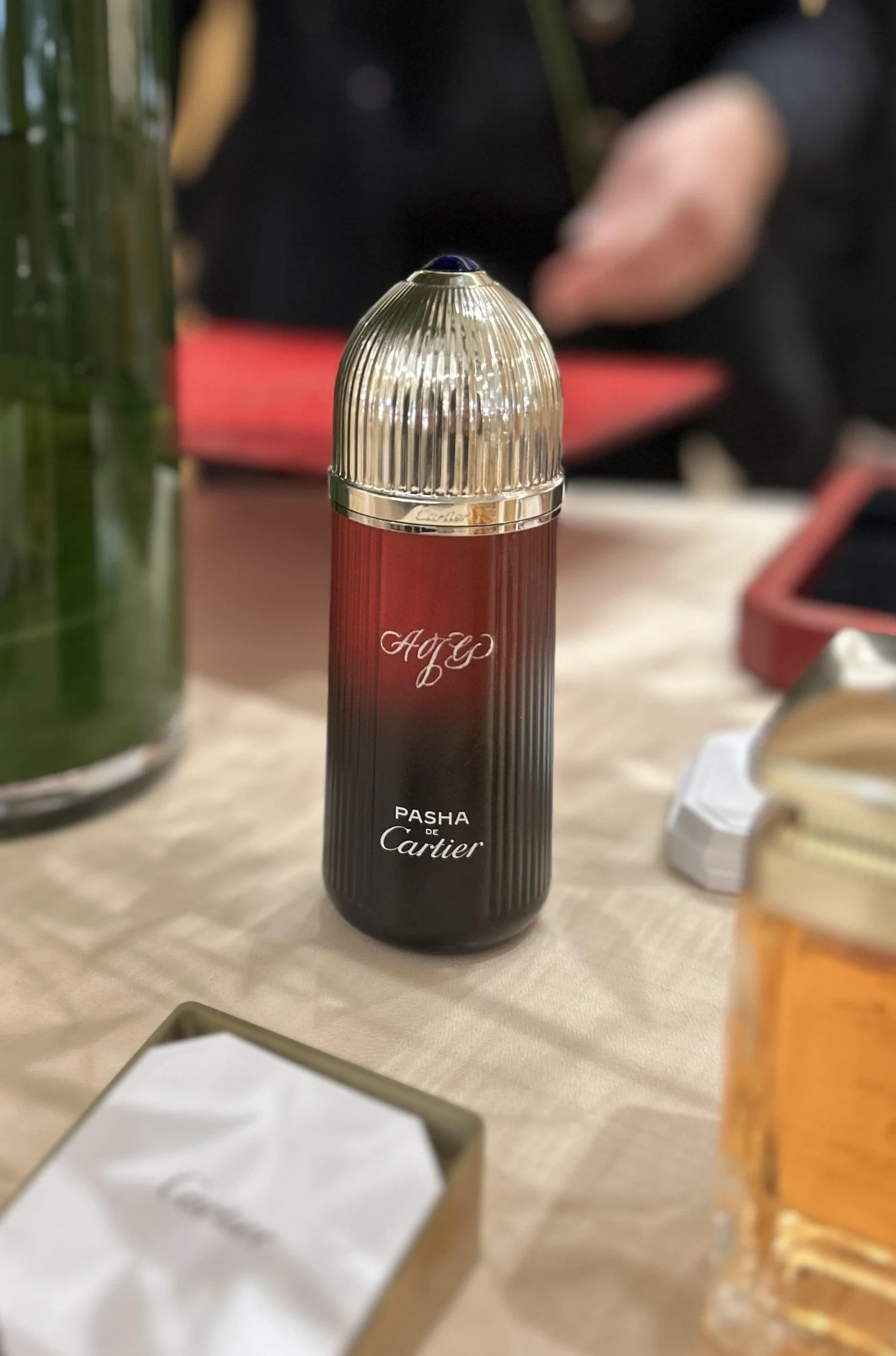live engraving on Cartier fragrance bottle for a luxury brand activation