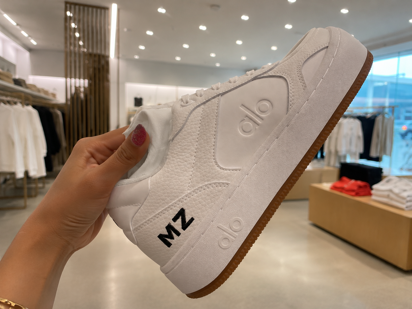 Alo shoe personalization with custom hand lettering for a live brand activation in Detroit