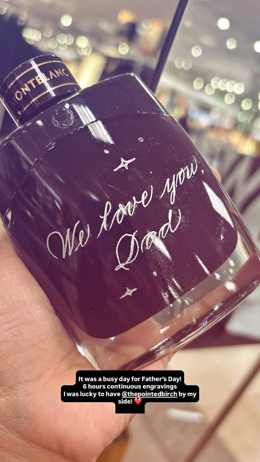 Live hand engraving of personalized initials on a luxury product during an in-store brand activation.